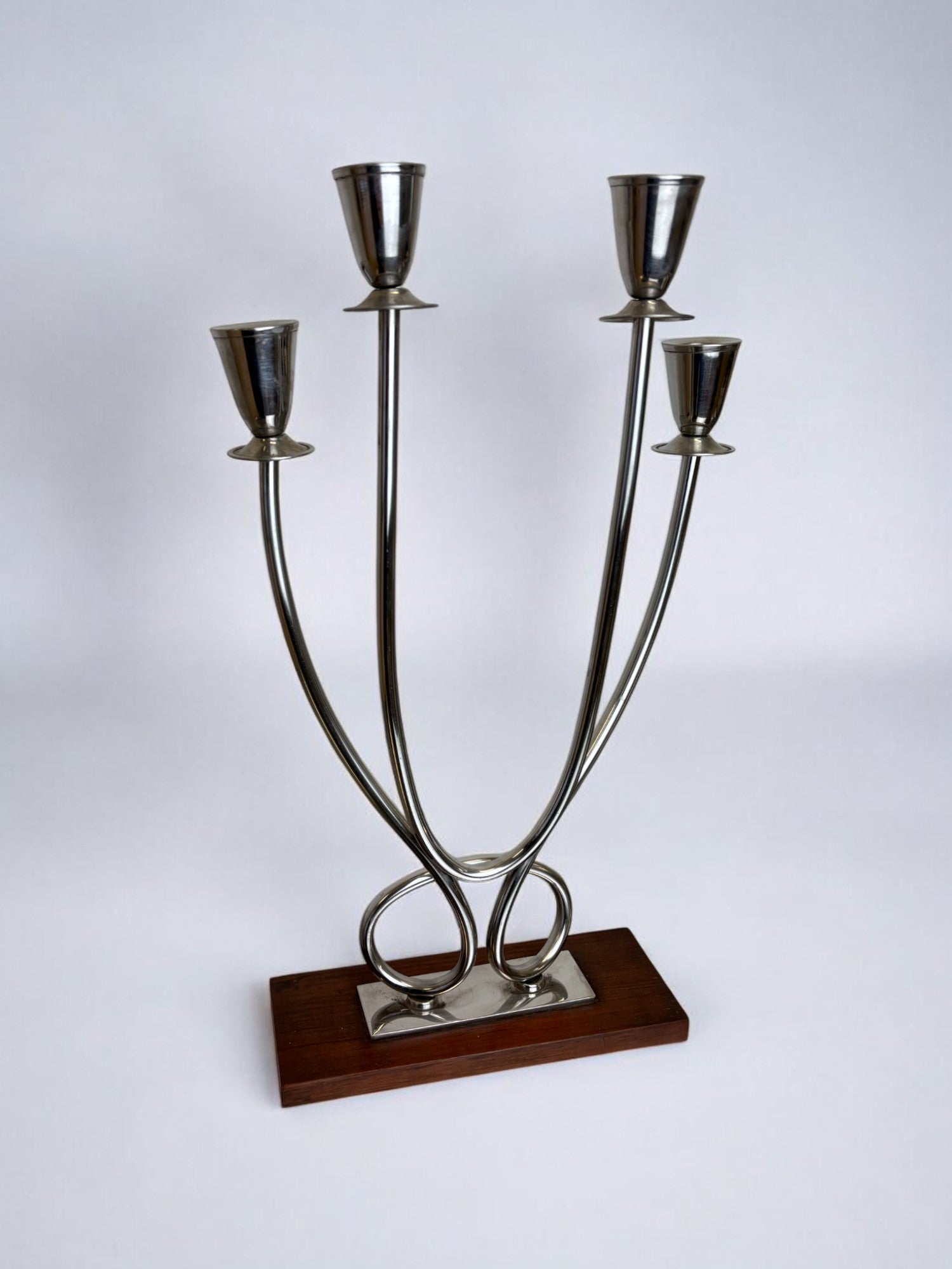 Art deco candlestick in stainless steel and rosewood, 4 flames, Spain, 1970's — lifestyle setting