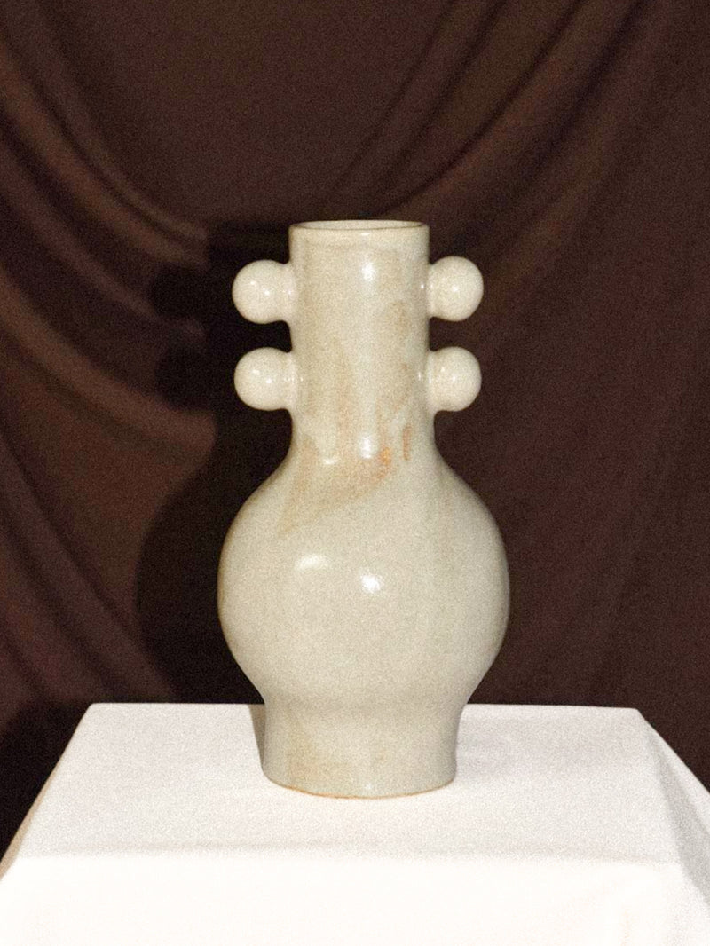 Long Neck Vase by Landy Rakoto Ceramics | The Oblist — handcrafted ceramic, neutral color