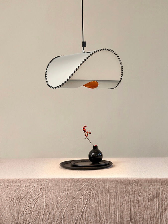 Zero' Pendant Light — close-up of white metal shade with orange accent