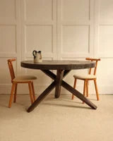 Circular wooden table — alternate view