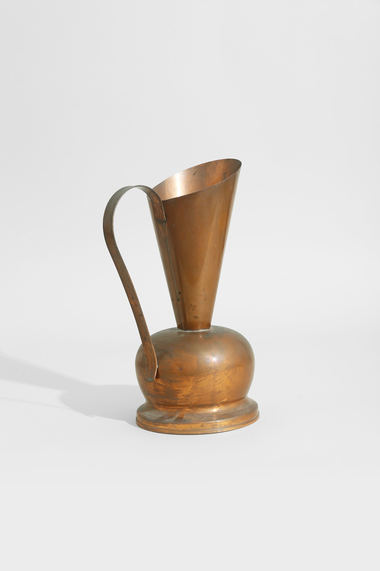 Copper Sculpture Pitcher — lifestyle setting