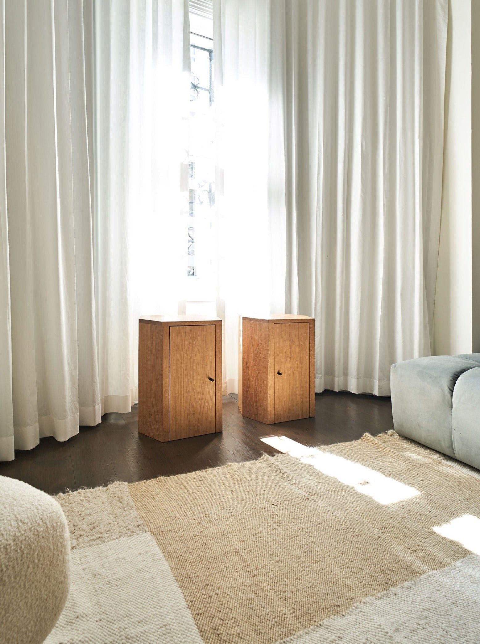 Pair of Park Night Stands in Oiled Oak — side angle in bright room