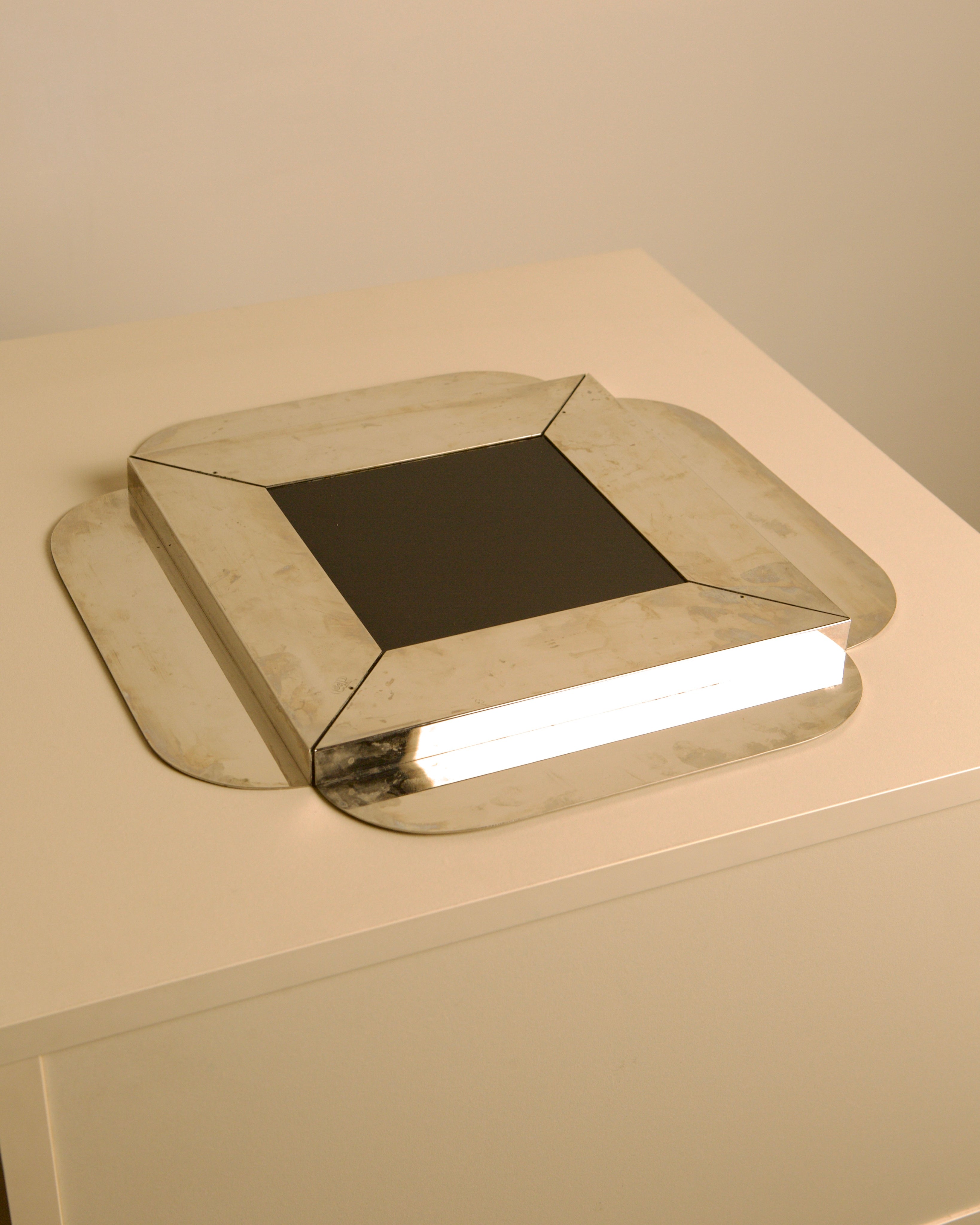 Large Italian Silver-plated Glass and mMtal Tray by C&P Italia 70s — top view on light-colored surface