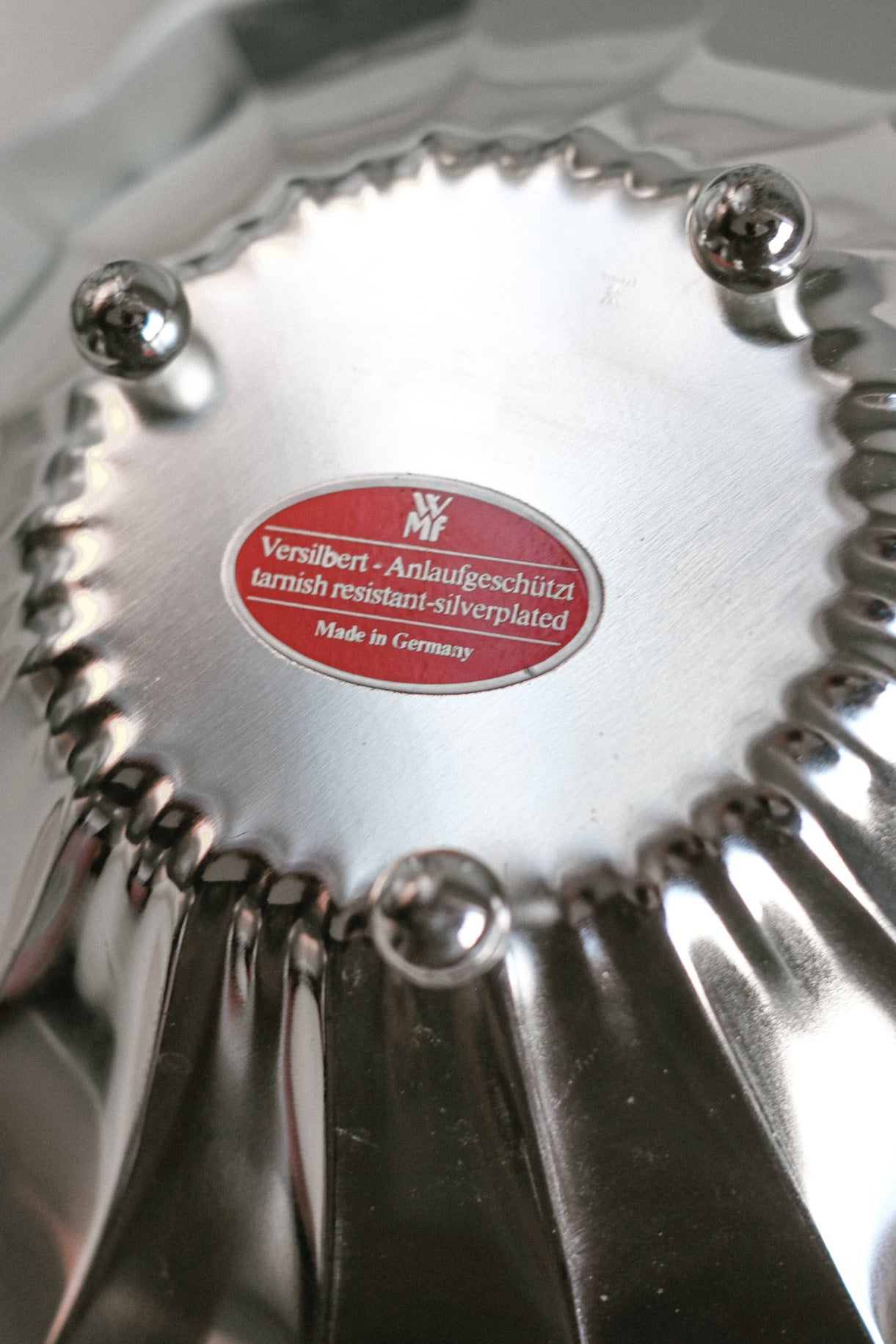 Silver-Plated Footed Bowl — underside view showing tarnish-resistant label