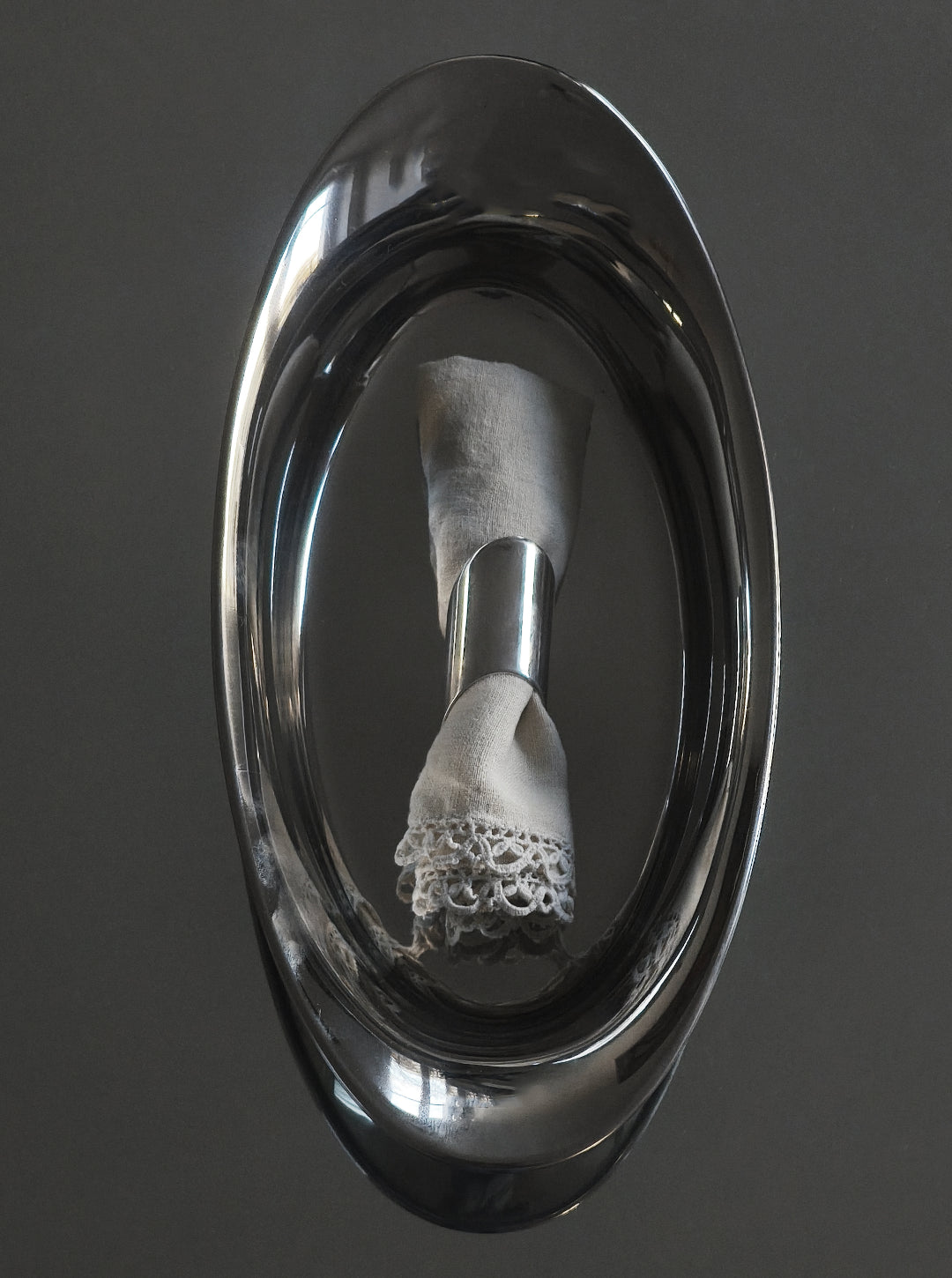Oval Steel Dish — top view with napkin holder detail