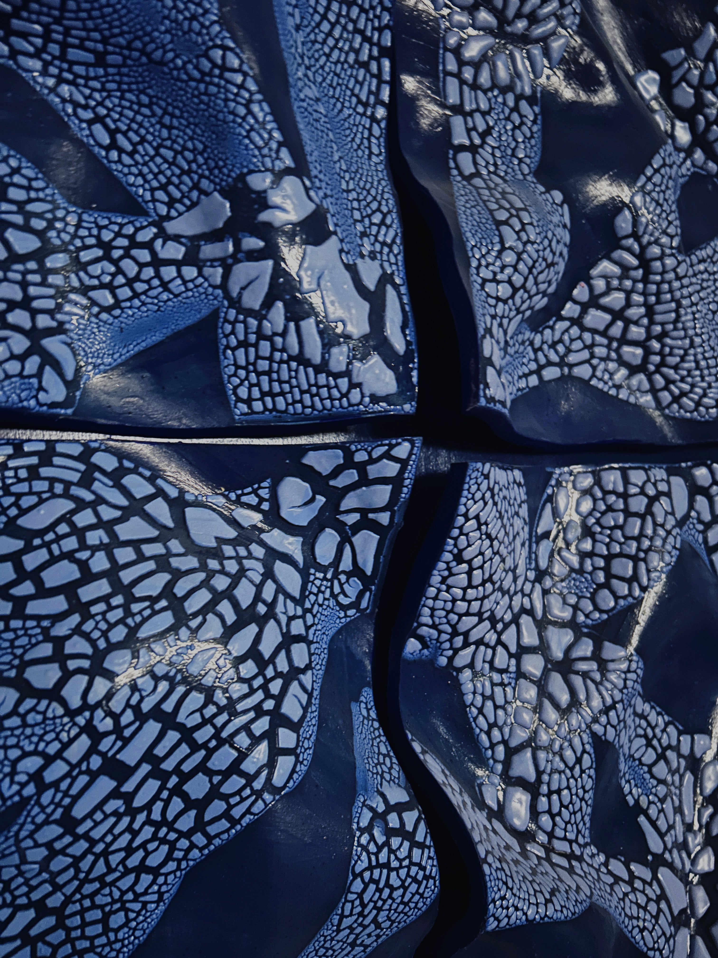 Blue ceramic Wall Sculpture — close-up of textured blue surface