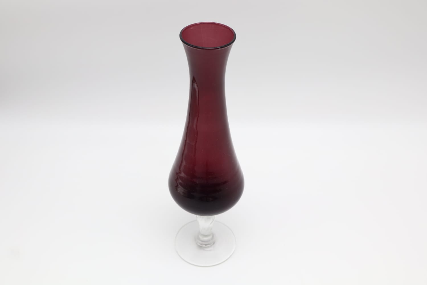 Elegant Mid-Century Eggplant Glass Bud Vase on Clear Pedestal Base (c. 1960) — detail view