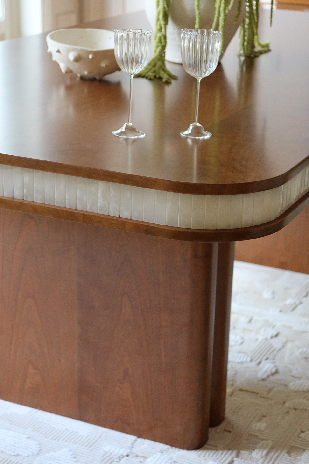 Doppio Wood And White Onyx Dining Table — top view with wooden surface and onyx detail