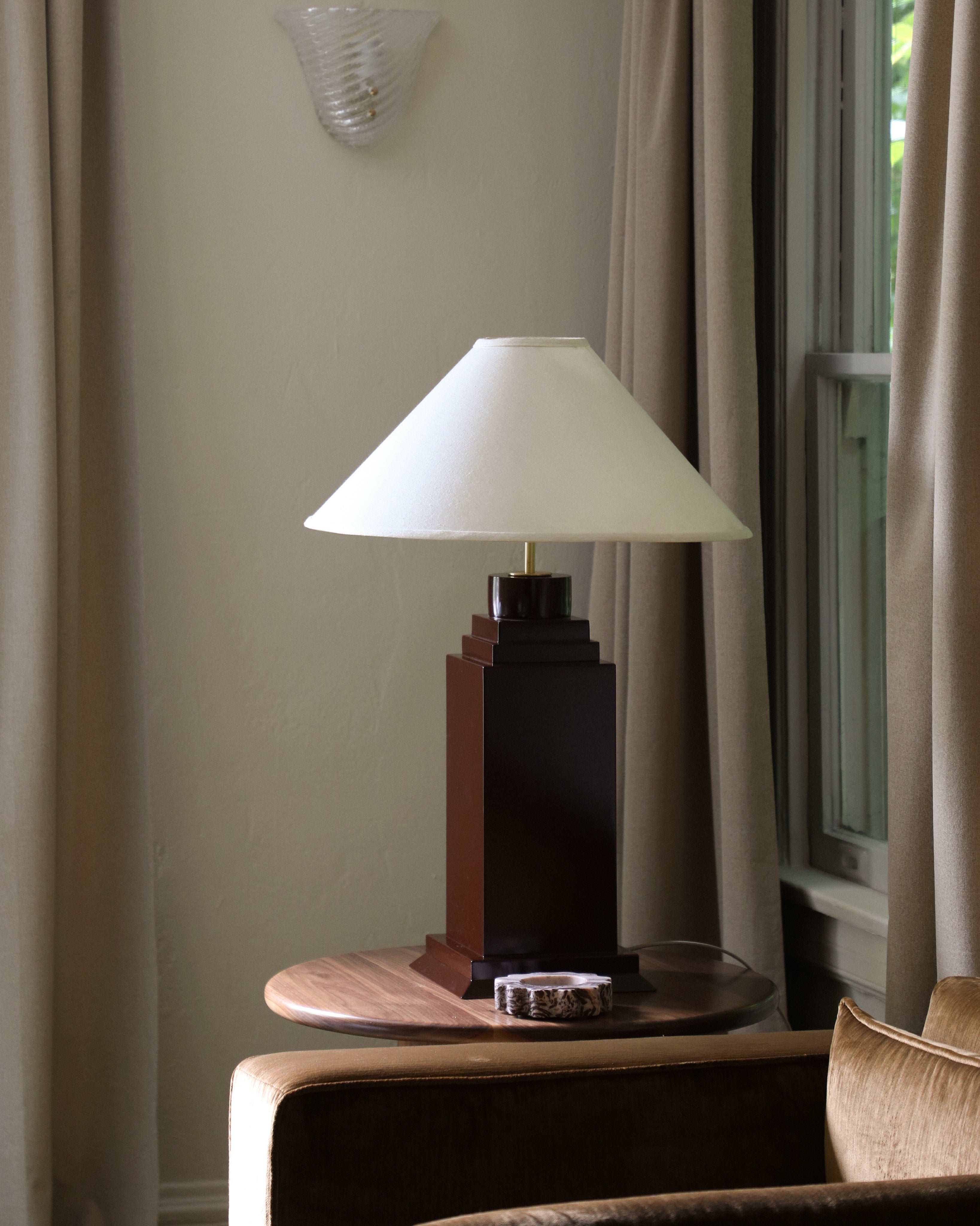 Hudson Table Lamp — positioned on wooden side table in living room