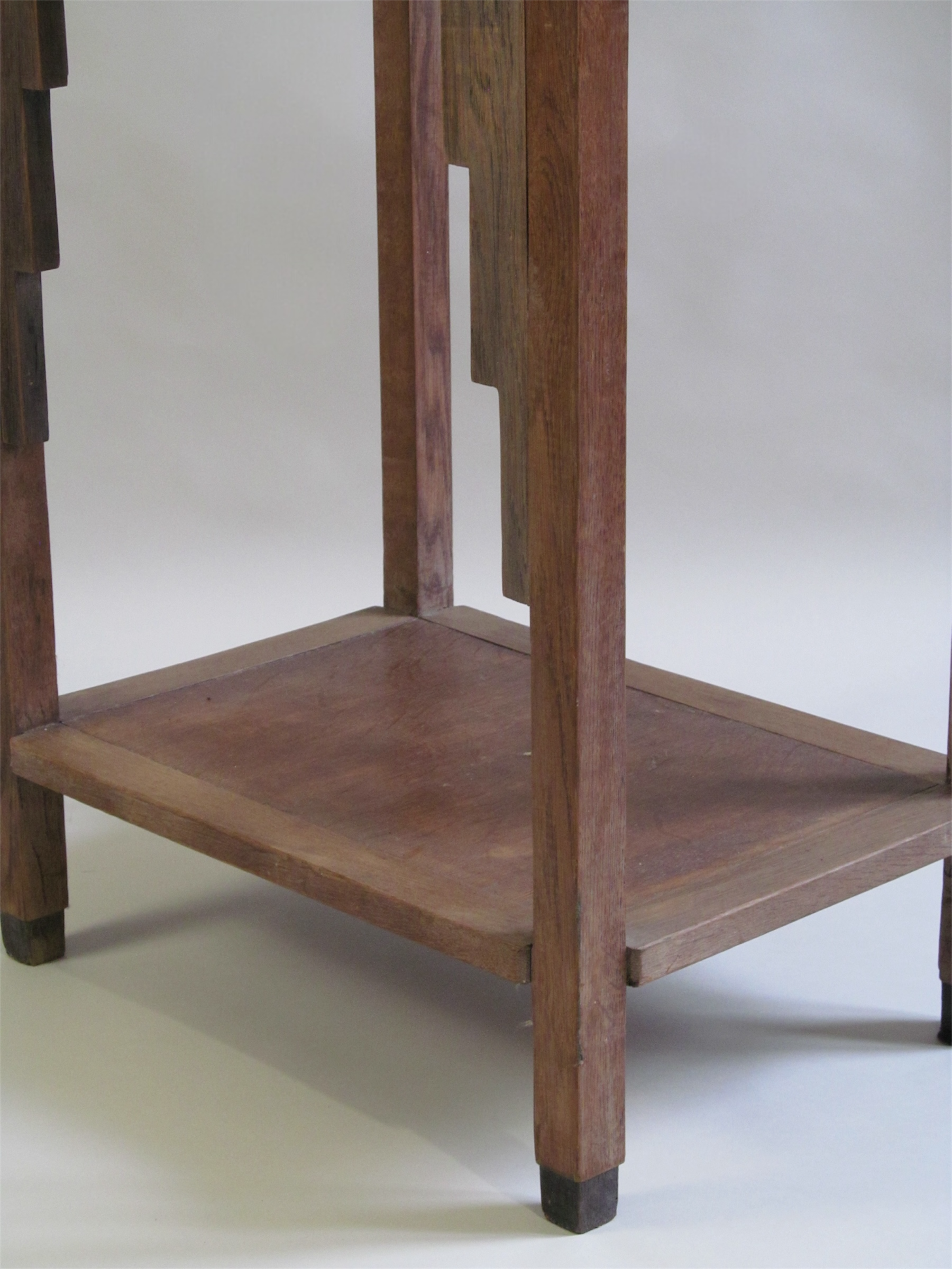 Amsterdam School Side Table c.1920 — side angle showing wooden legs and lower shelf