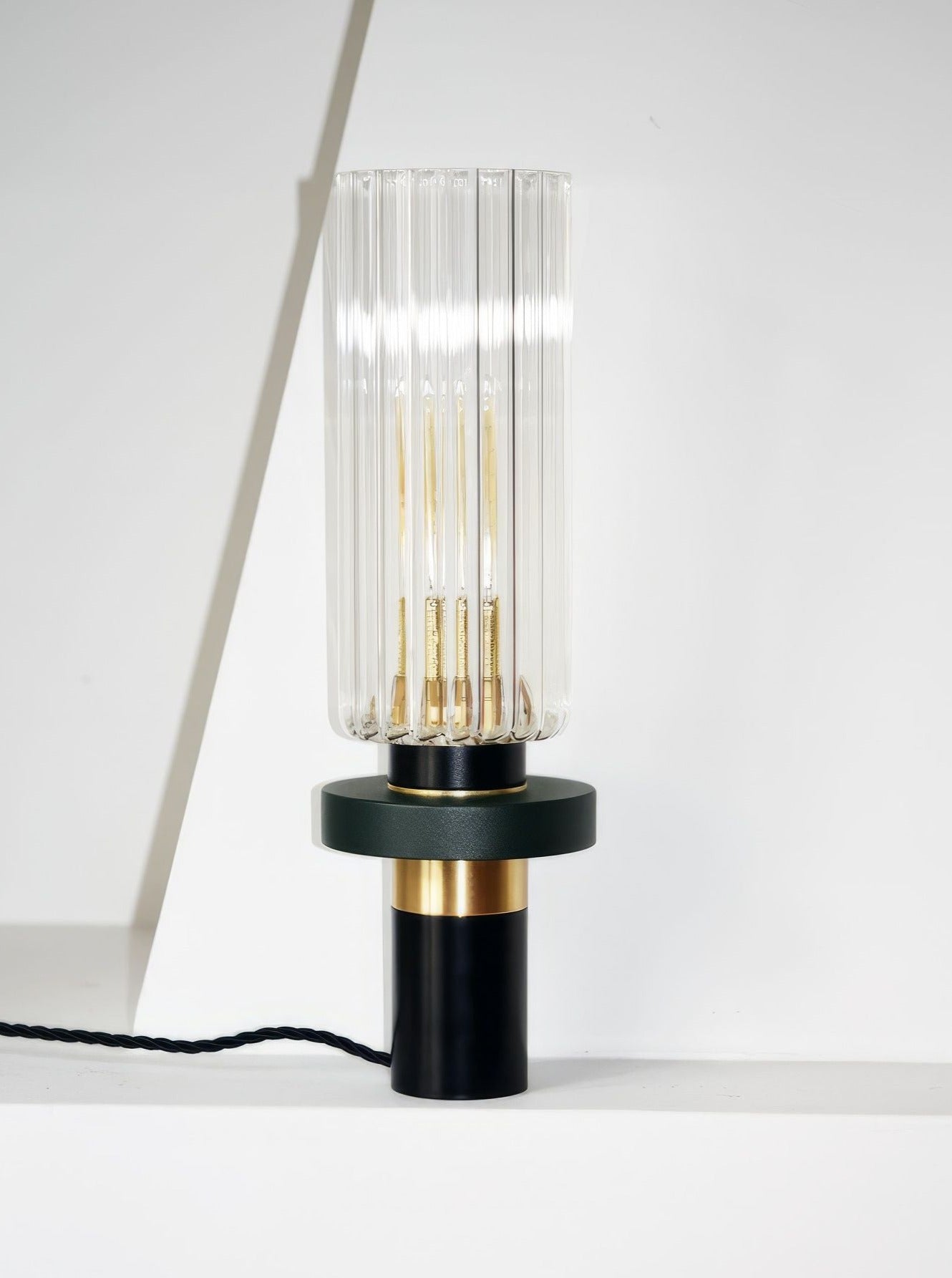 Alexandre Table Lamp — close-up of glass shade with brass details