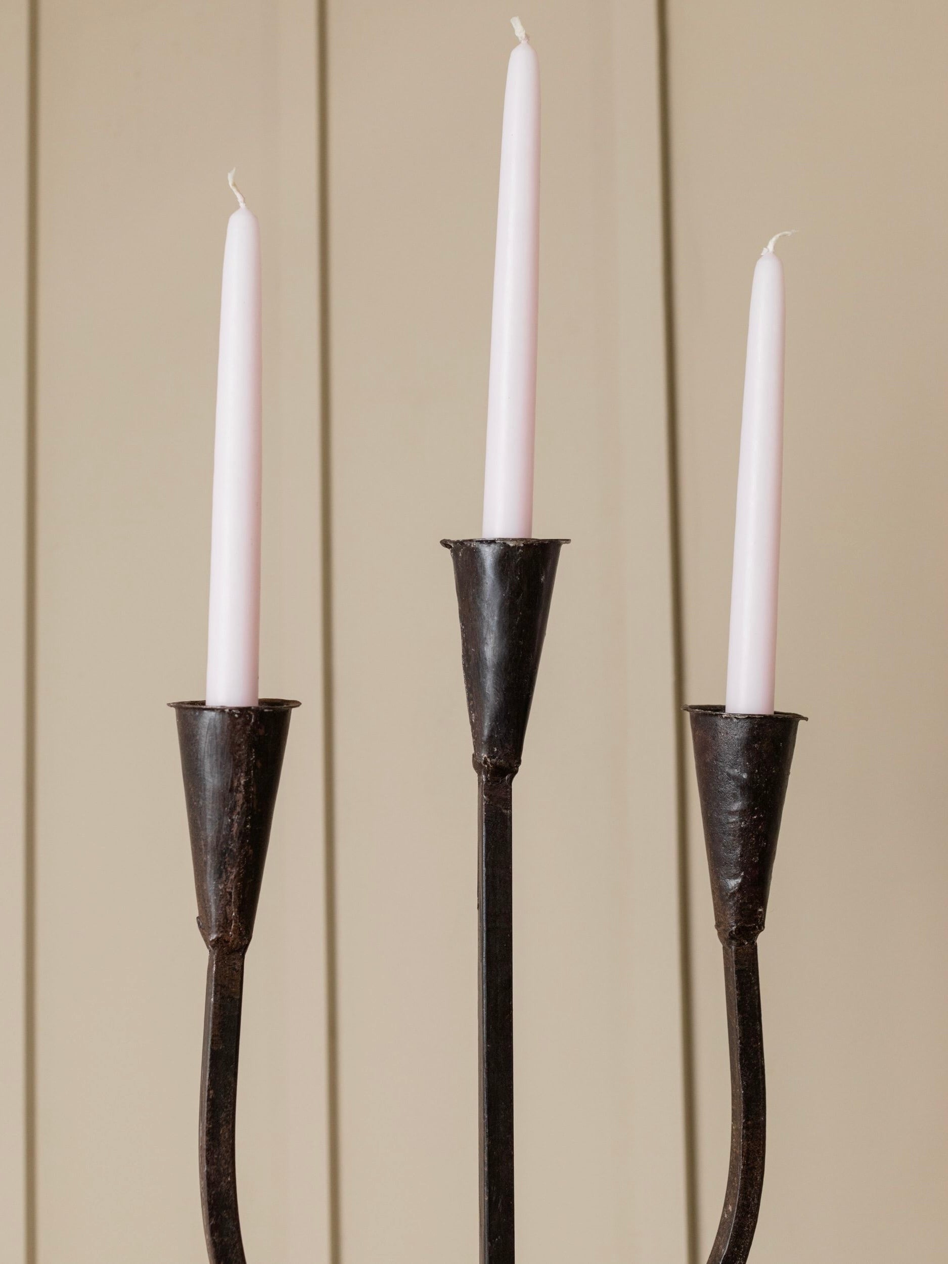 XXL Brutalist metal Candle Holder Italy 1960s — three candle holders in modern interior setting
