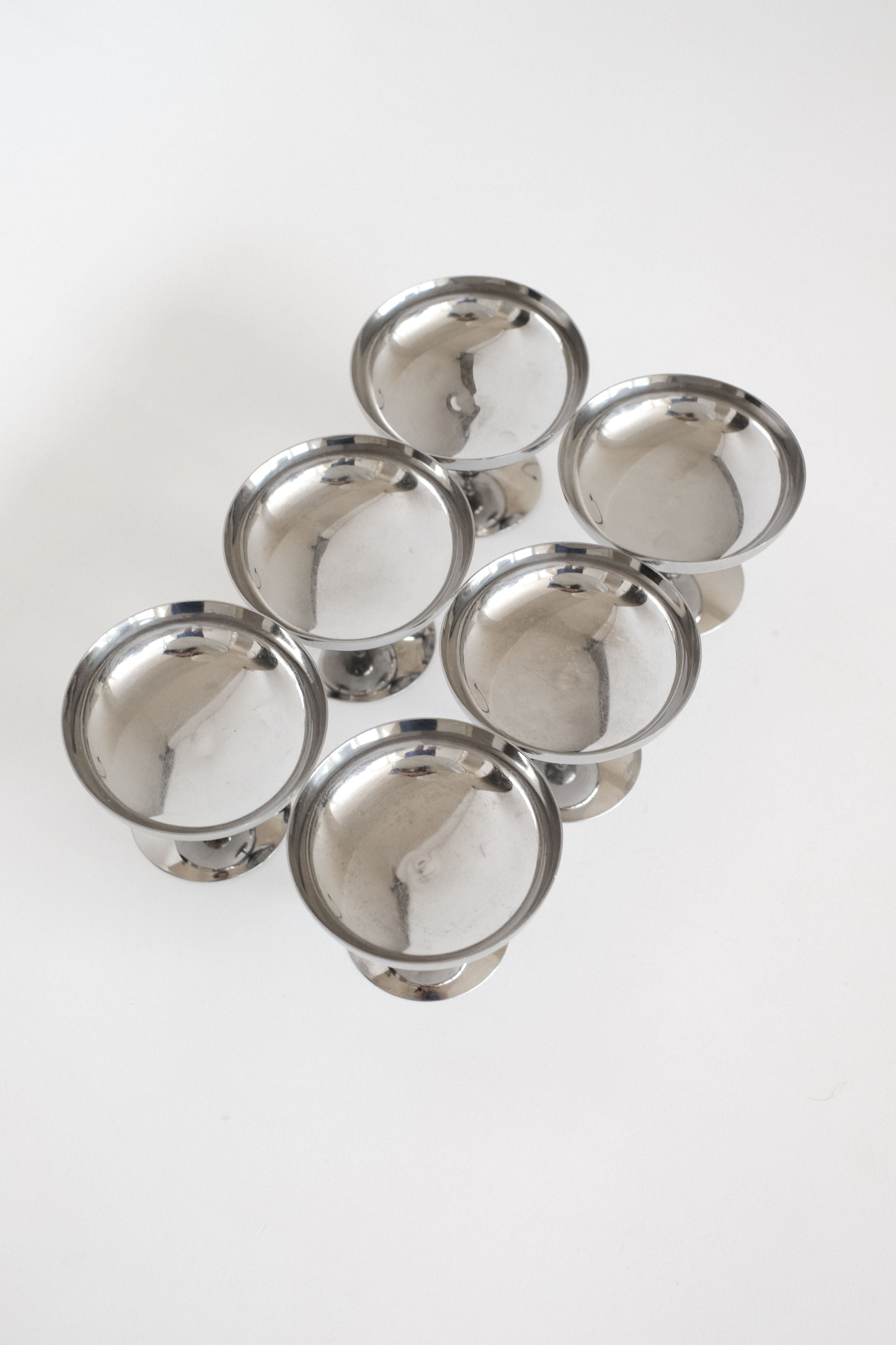 Set of 6 Ice Coupes — top view of polished stainless steel dishes