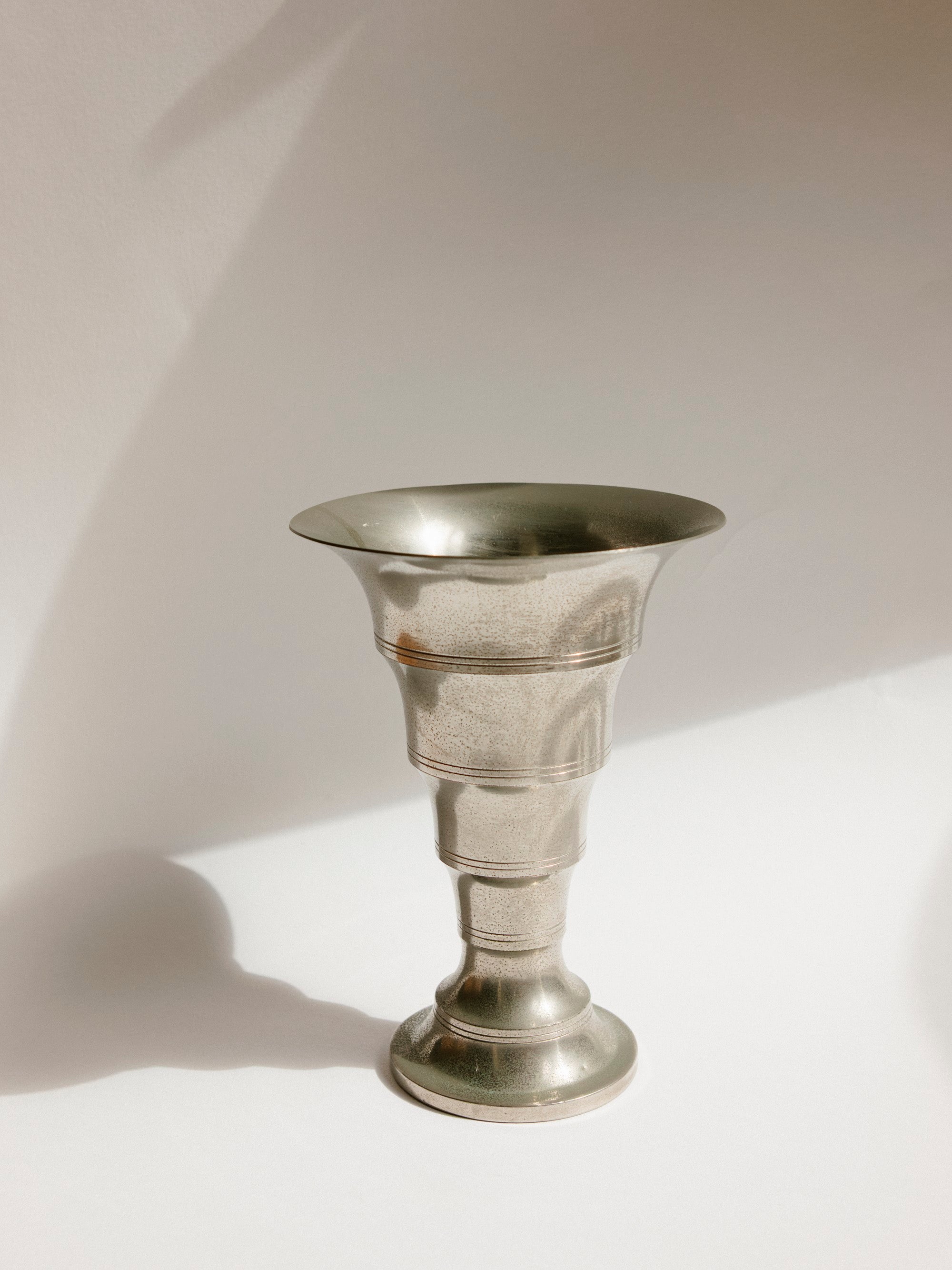 N.V. Metawa Tiel Stepped Art Deco Pewter Vase, Netherlands c. 1930s-1950s — lifestyle setting