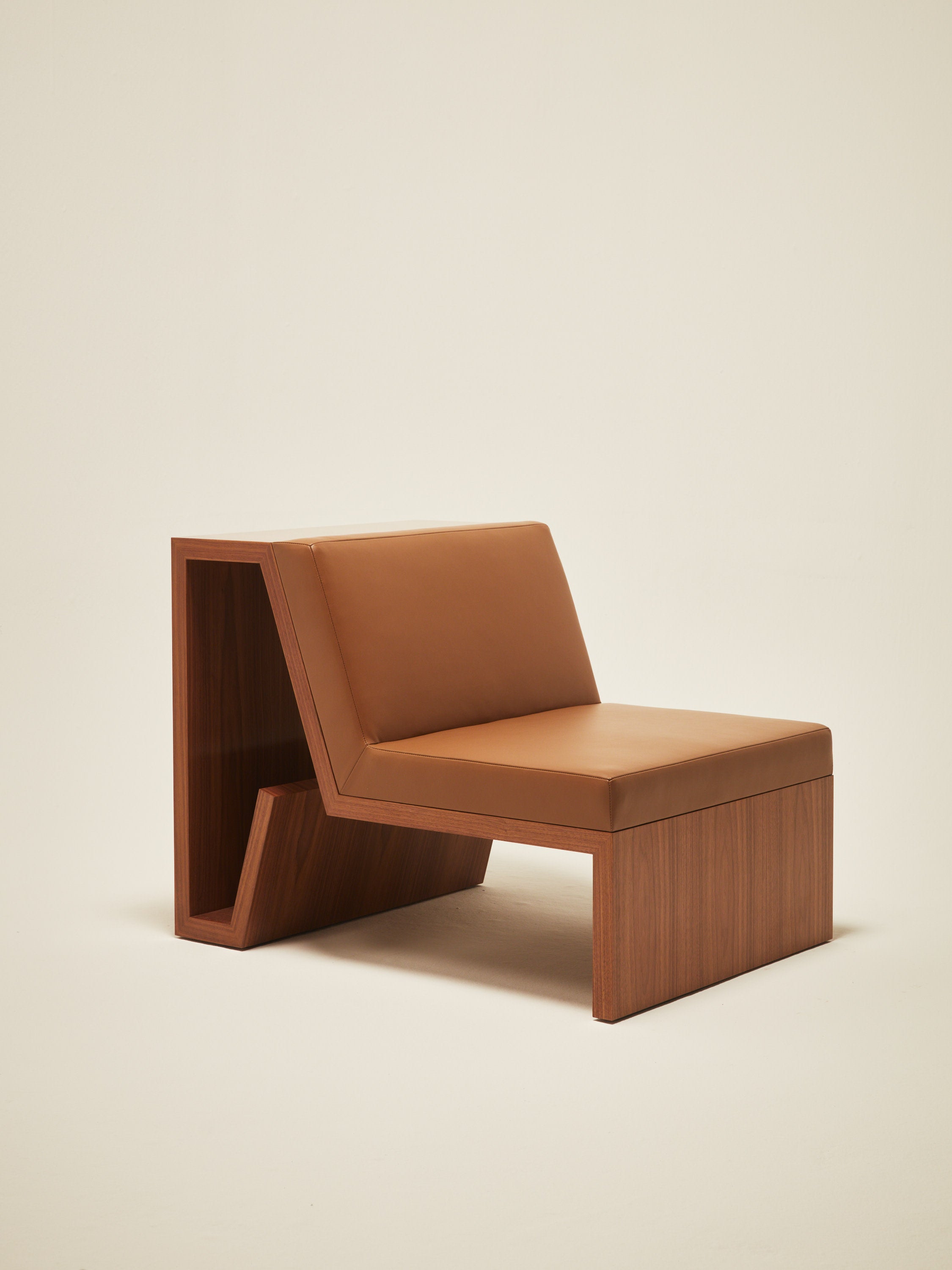 'Continuous' Lounge Chair Handcrafted in Wood Veneer & Leather Upholstery — close-up