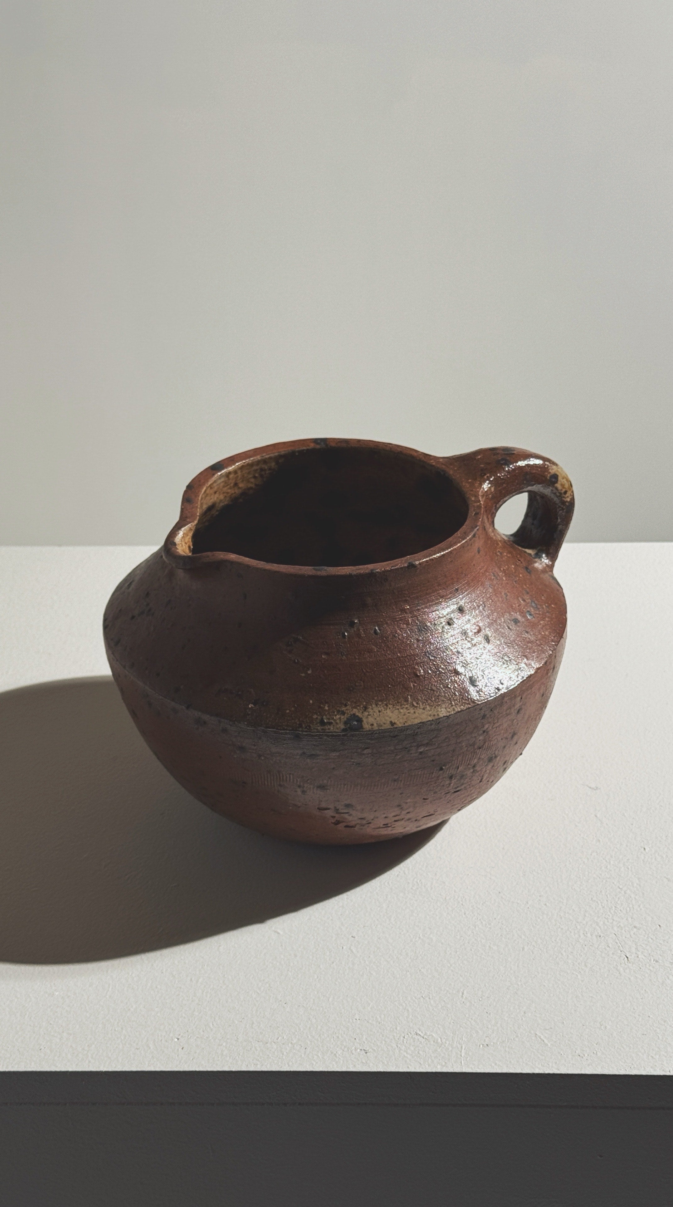 Sculptural brown stoneware pitcher by Pierre Digan close-up view