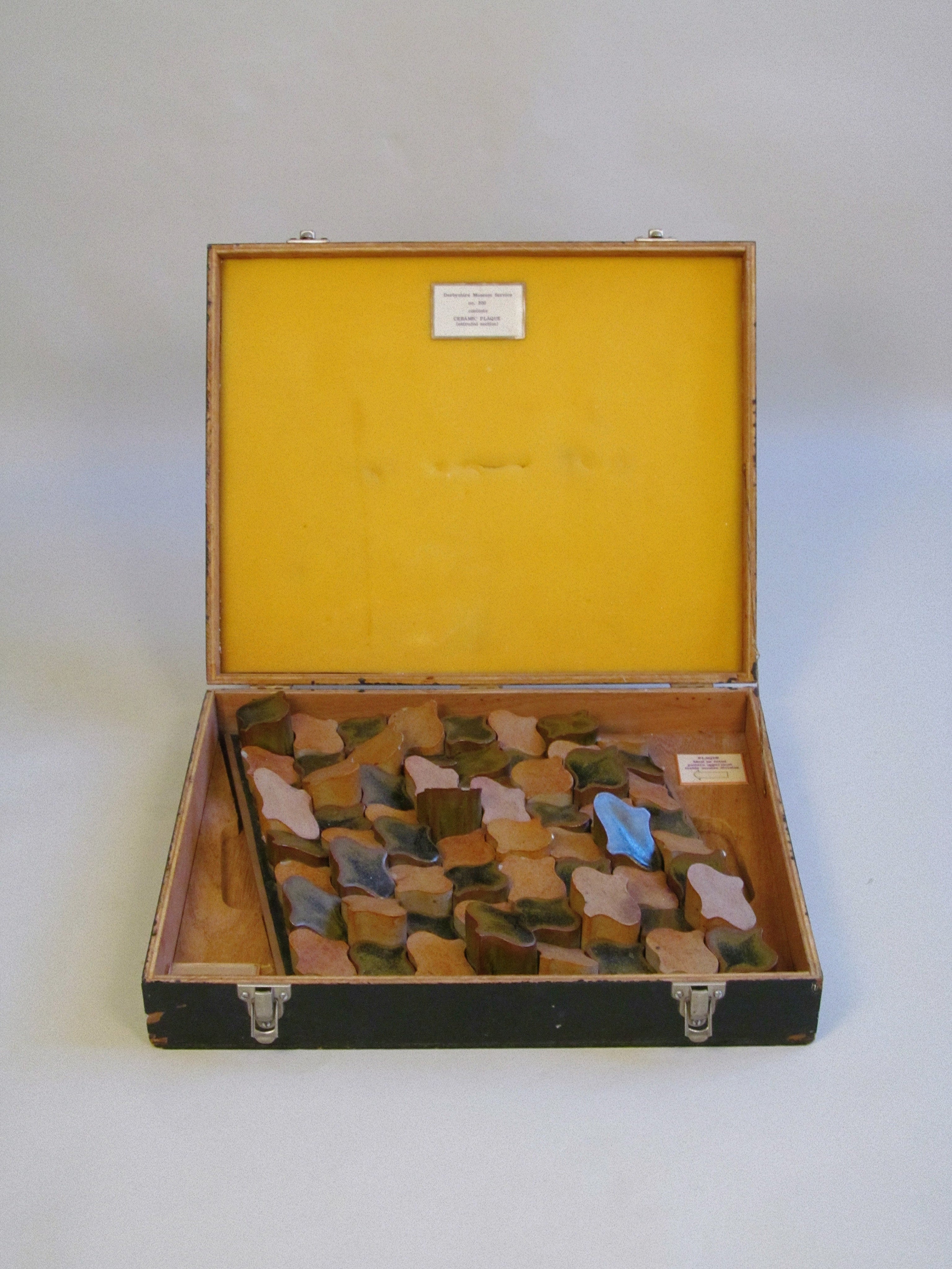 Derbyshire School of Art Ceramic Wall Plaque with Original Case c.1970 — open case showing ceramic pieces arranged inside