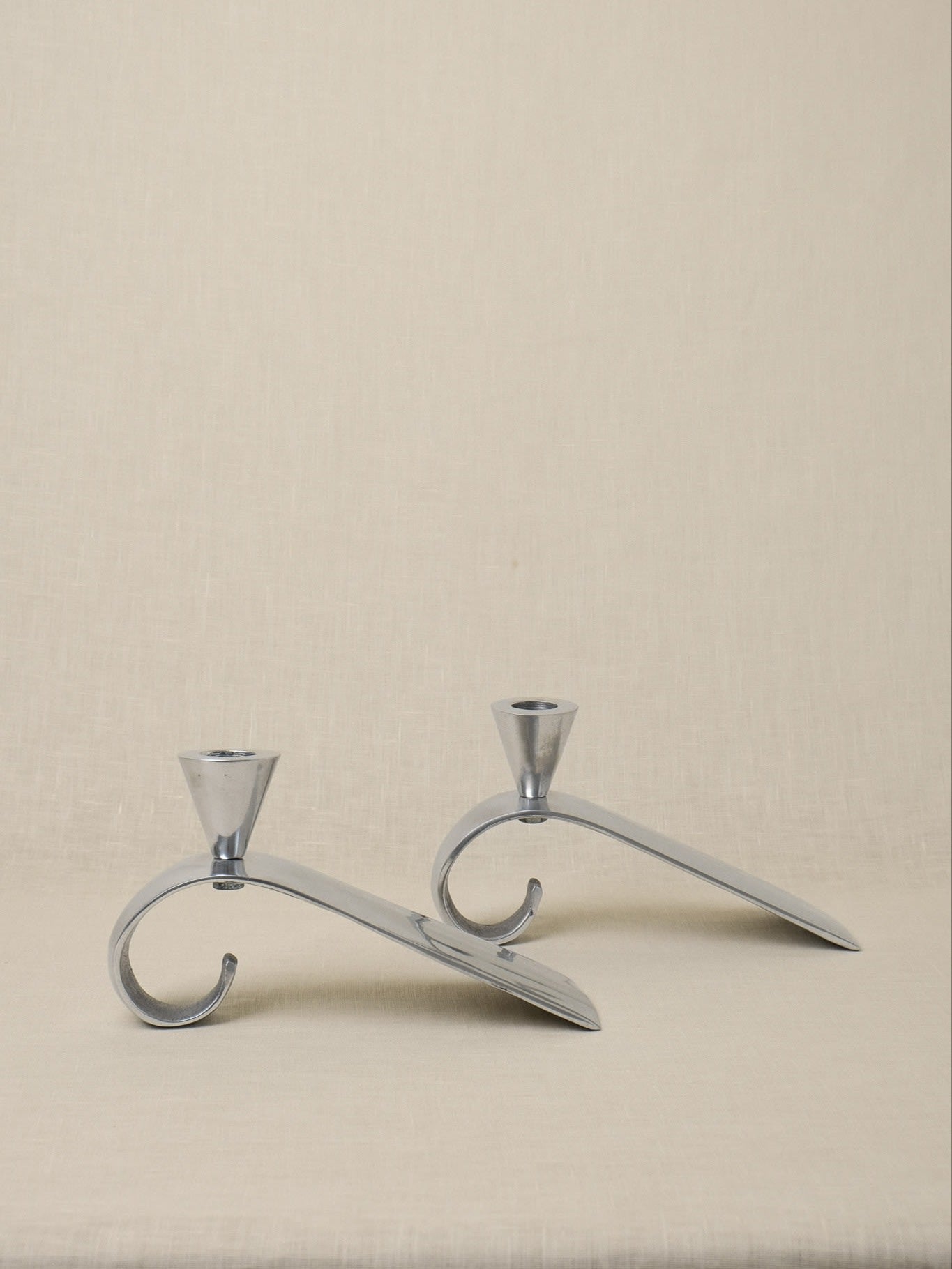 Set of 2 Comma Candlesticks, Attributed to Matthew Hilton — close-up