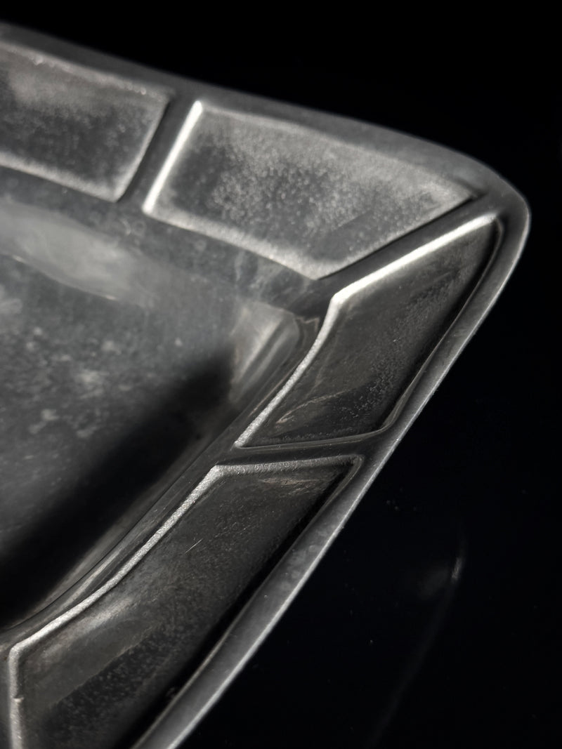 Solid Aluminium Brutalist Bowl - 1960s — close-up of angular textured surface