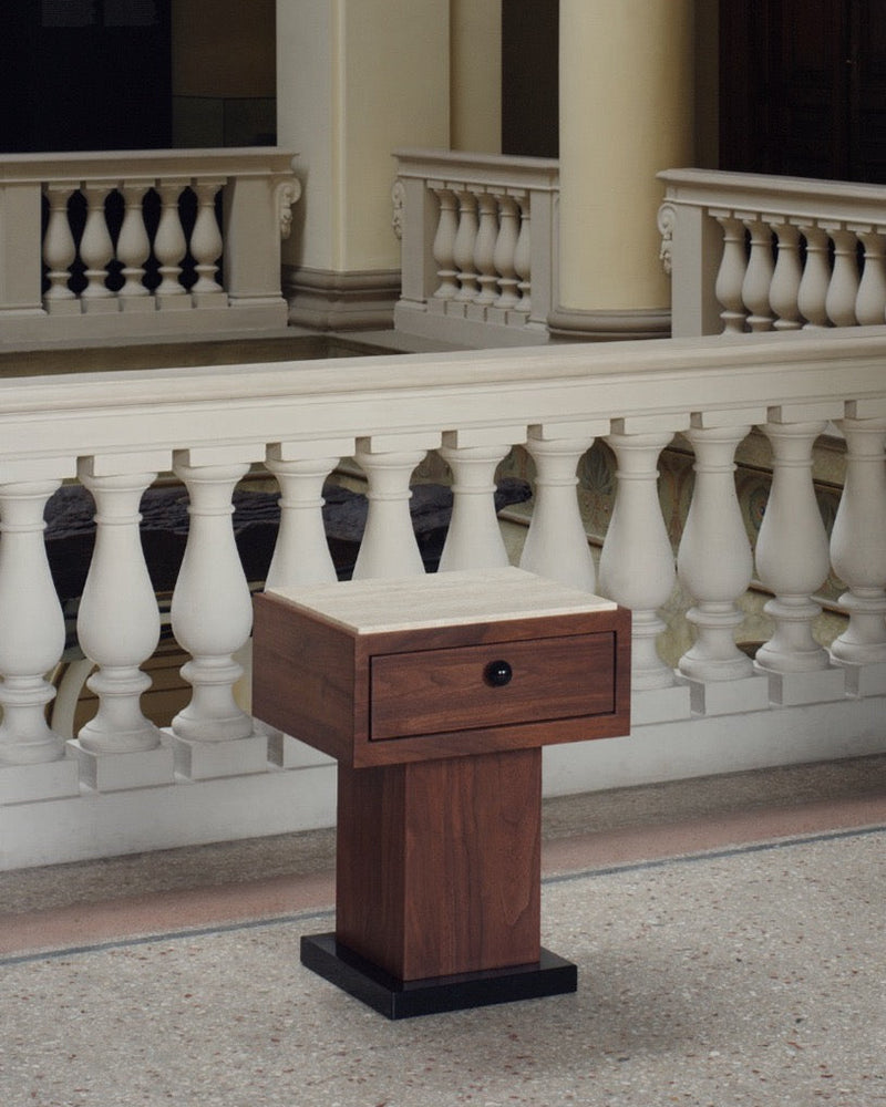 The Nightstand — front view with wooden drawer and marble top