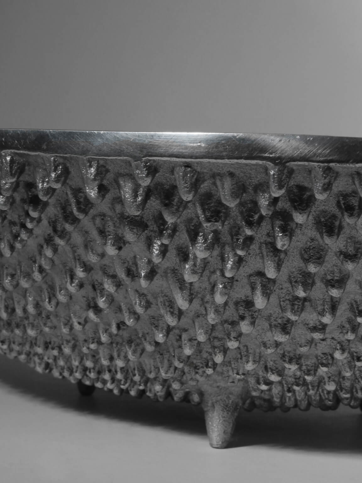 Contemporary Textured Aluminum Bowl On Legs — lifestyle setting