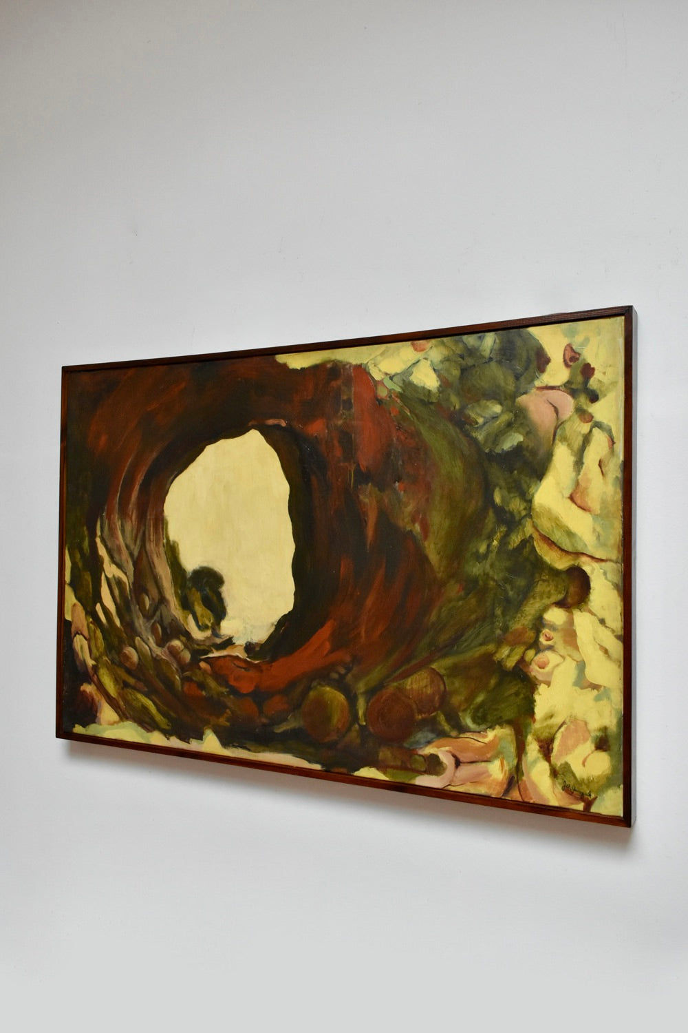 The Oil on Canvas Composition Painting by Ja Janczuk (Barracuda Interiors, 1970s) features earthy swirls of brown, green, and yellow in an abstract tunnel motif, evoking organic movement—shown here framed on a white wall.