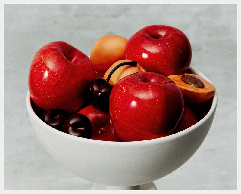 Medicis glazed earthenware bowl filled with red stone fruits detail