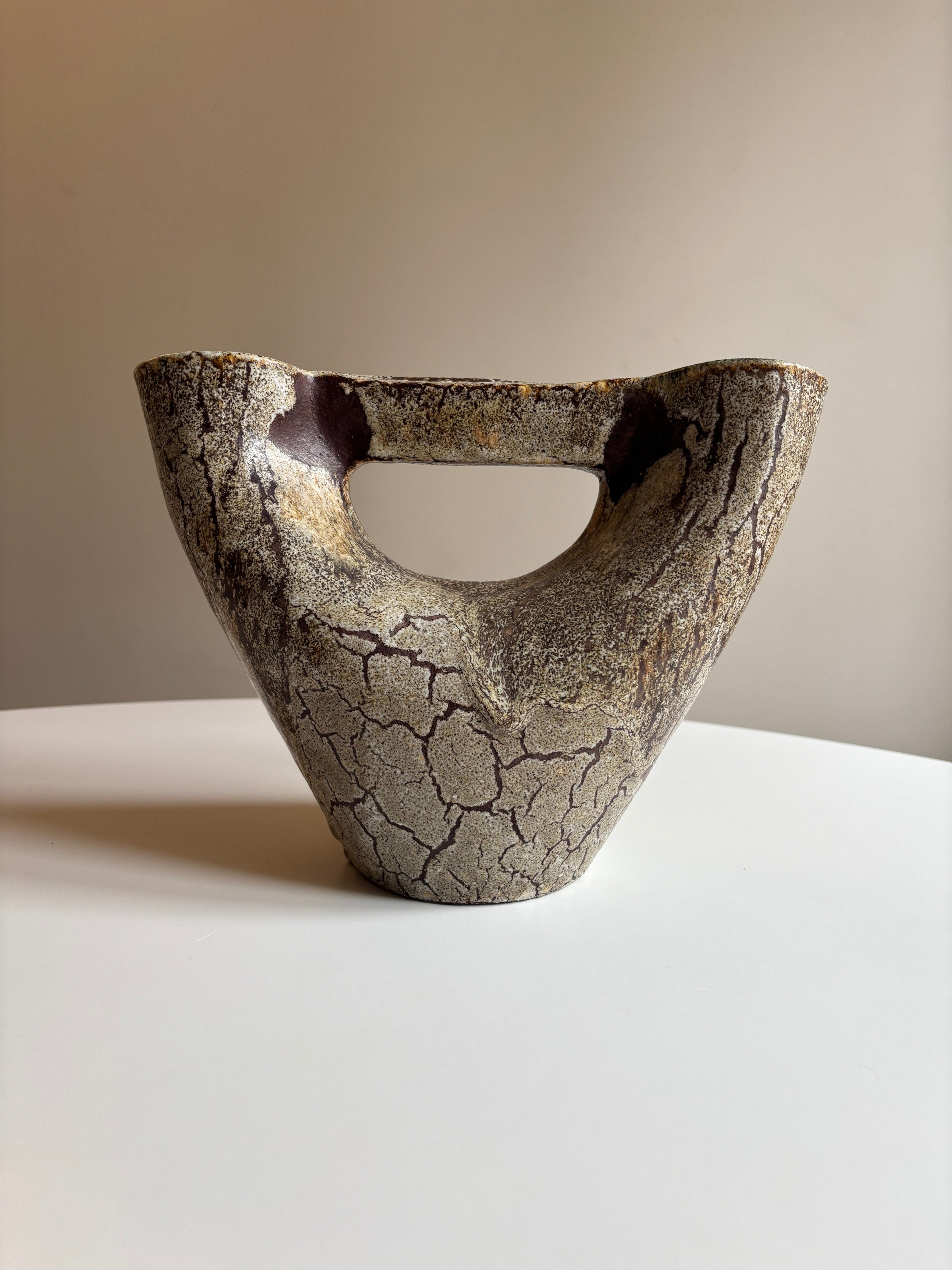 Brutalist Sculptural Ceramic Vase by Accolay — Burgundy, France, c.1950s — angled view on white table