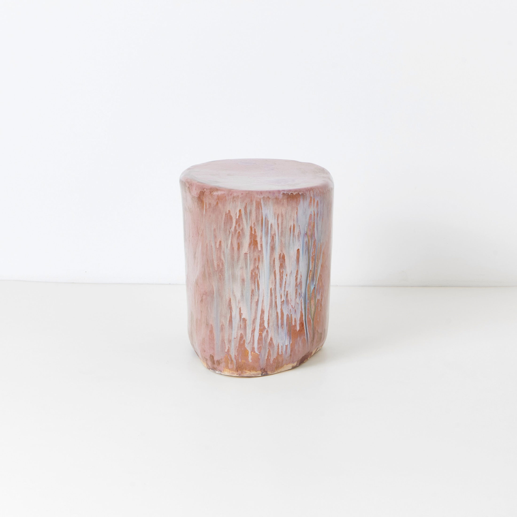 Small Ceramic Side Table — angled view showing pink drip glaze finish