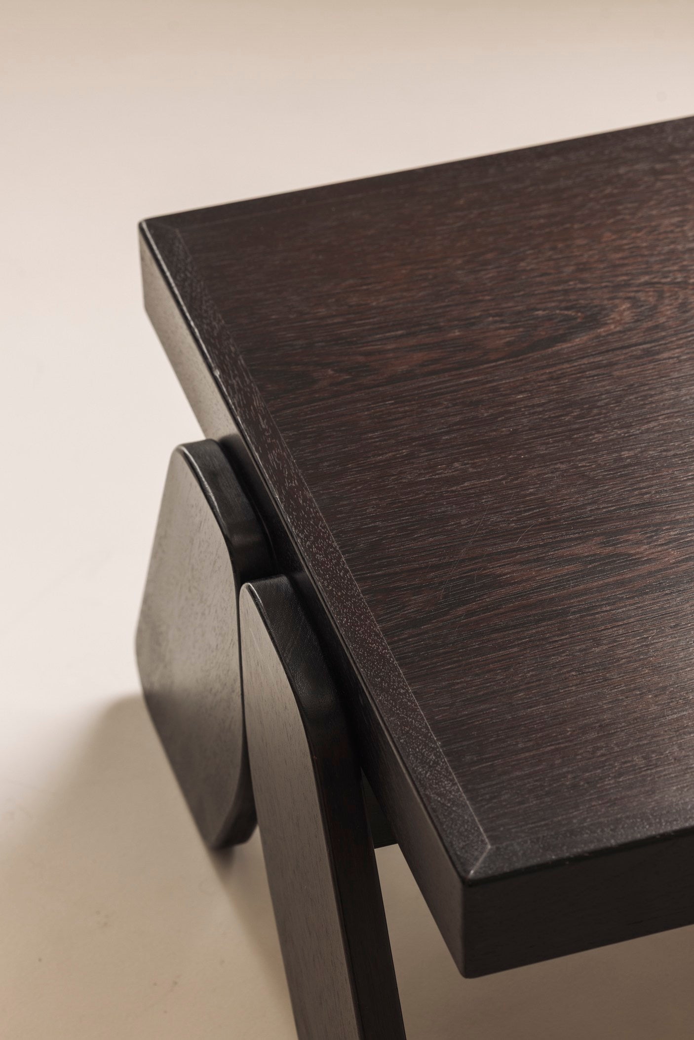 French brutalist coffee table in wenge, 1970s — side angle