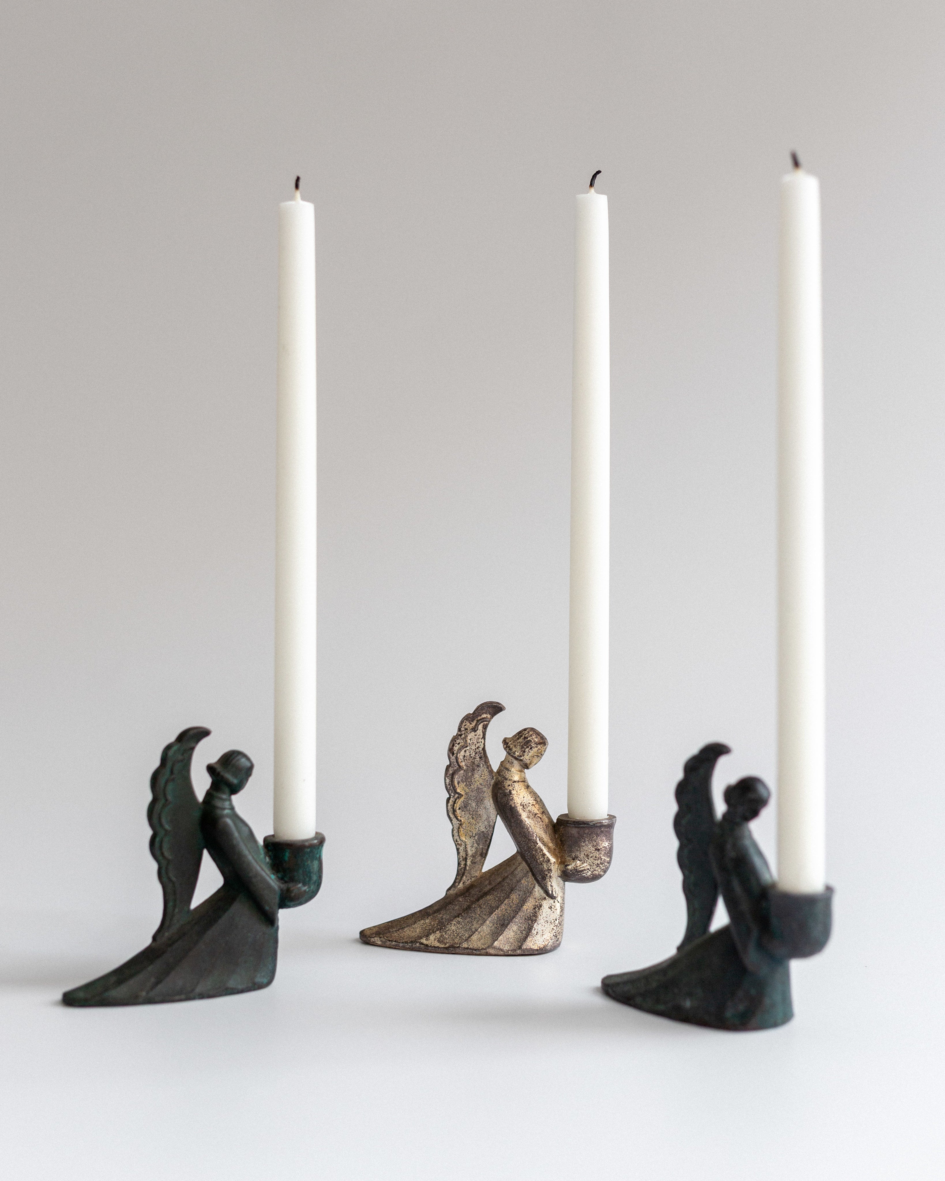 Set of Swedish Art Deco Figural Angel Candlesticks — side angle showing three candle holders