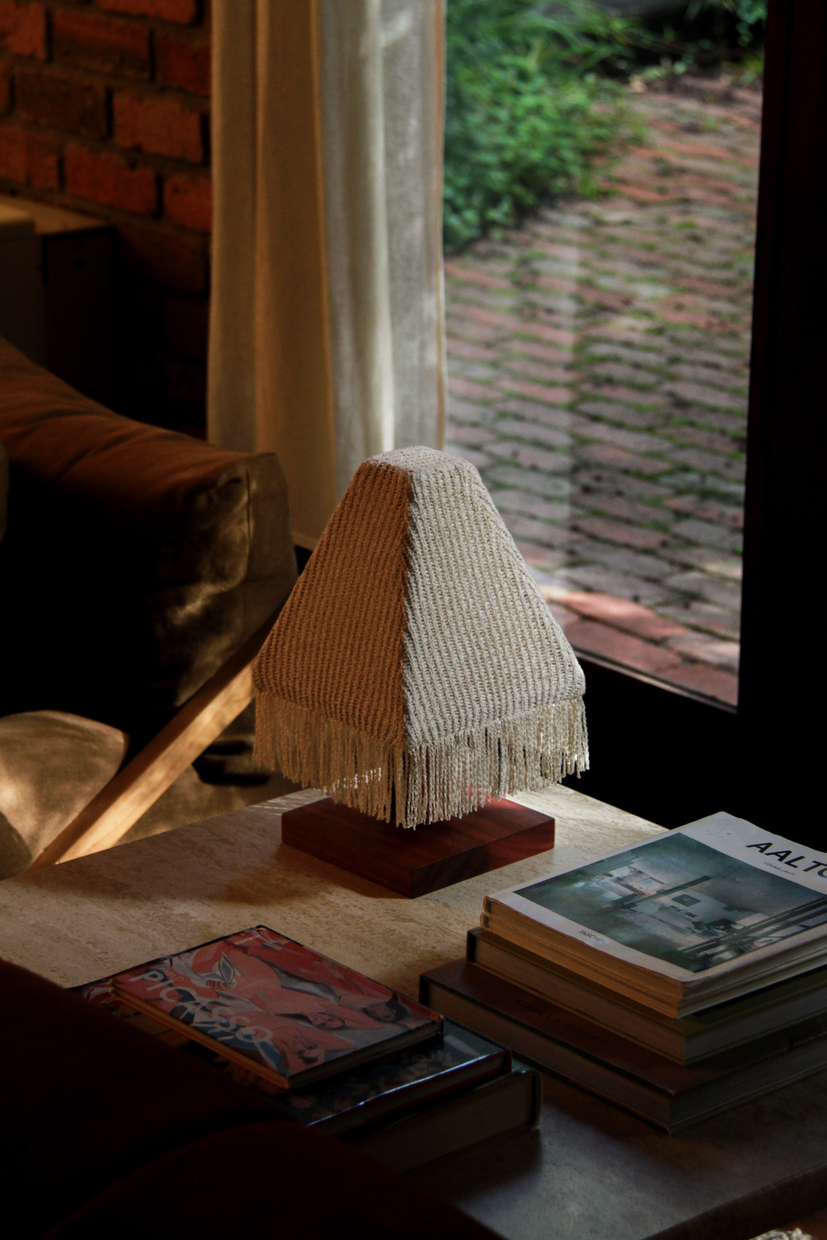 Cubozoa Table Lamp — side angle with textured fabric shade on wooden base