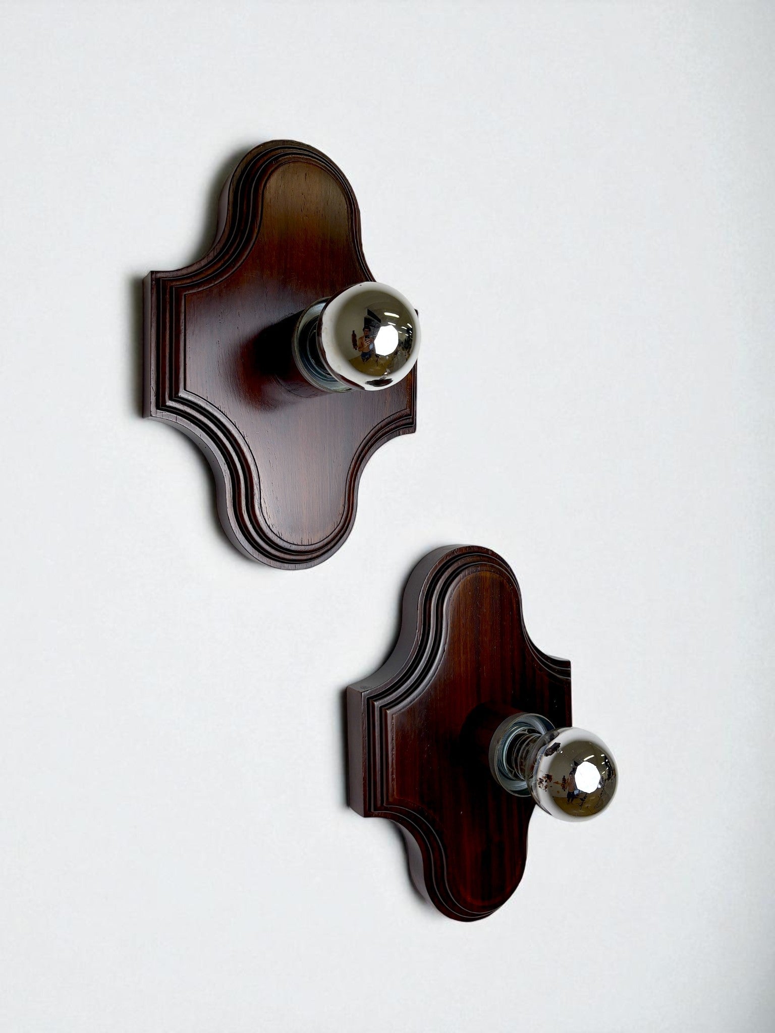 Pair of Geometric Art Deco Wall Lights, Carved wood, France, 1960s — lifestyle setting