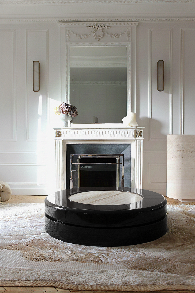 Yoyo Black And Ivory Onyx — side angle showing round black table in living room