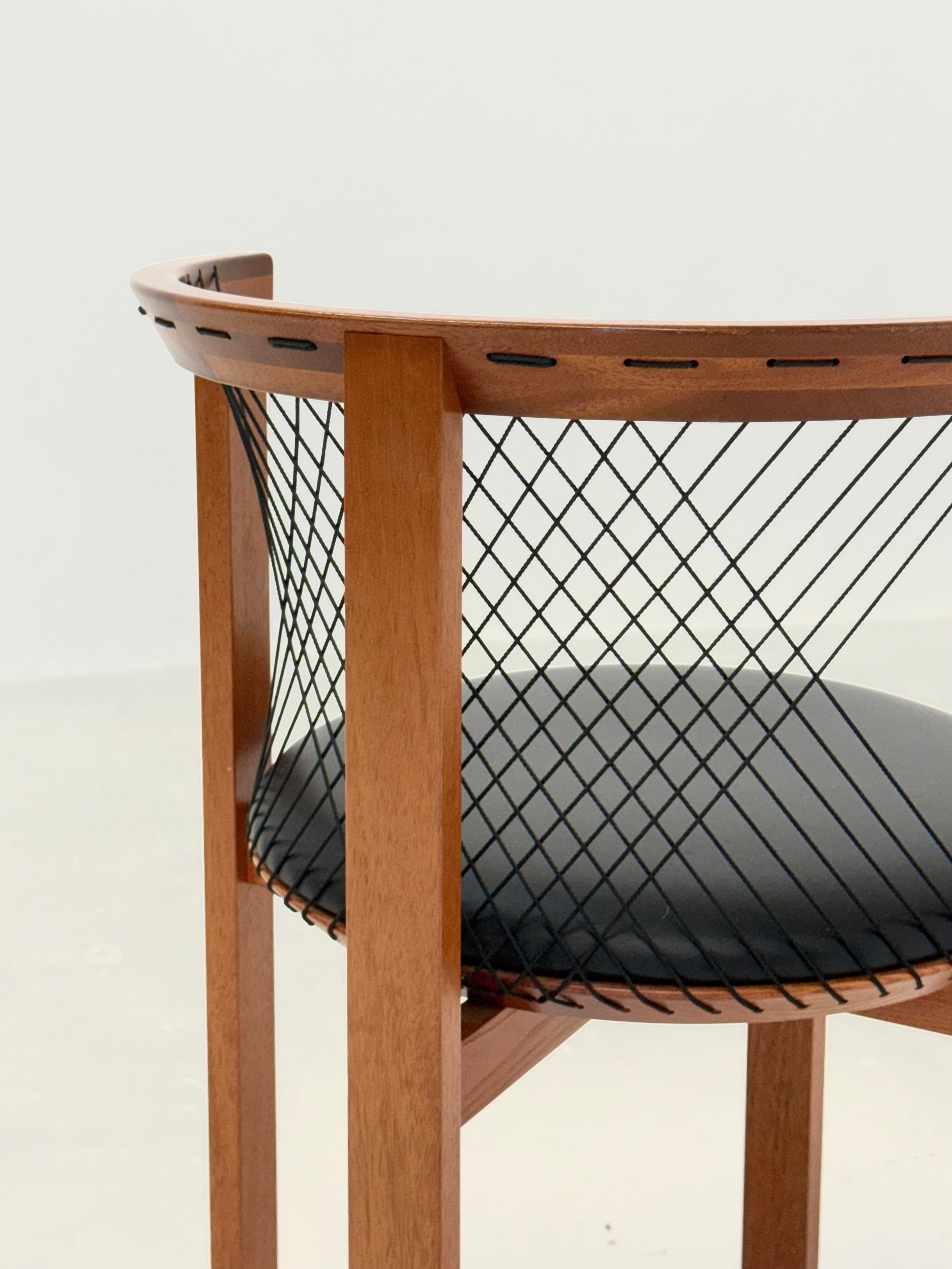 Set of Tranekær String chairs by Niels Jørgen Haugesen — lifestyle setting