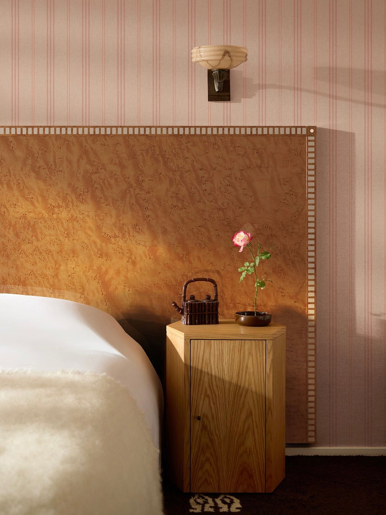 Aquarama Headboard in Birds Eye Maple — top view with bedside table and plant