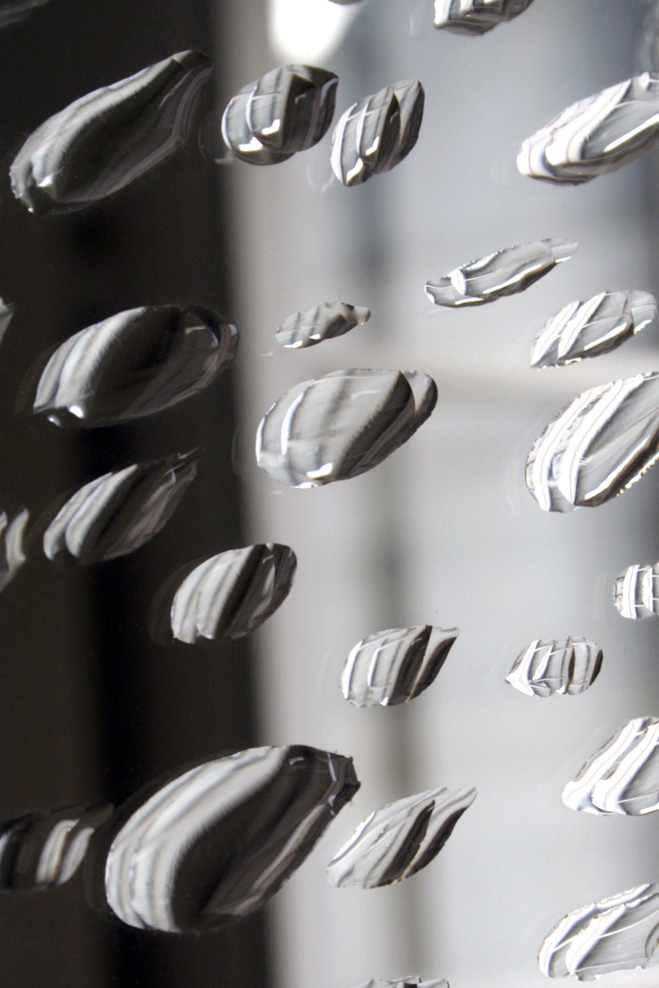 Mirror 11H20 — close-up of reflective surface with textured details