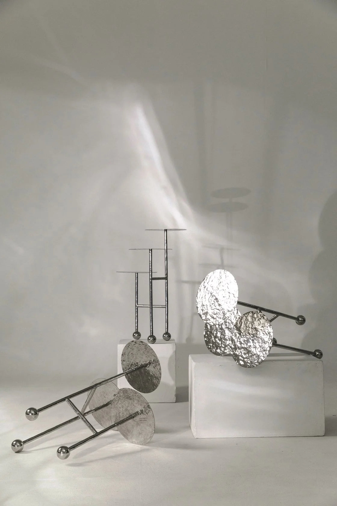 Liquid Side Table Stainless Steel — in context