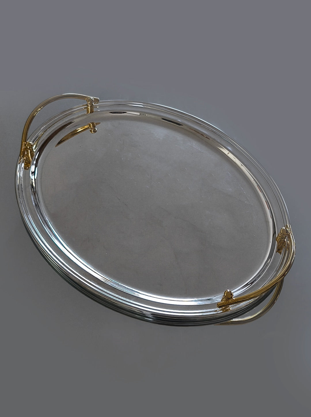 Large Oval Silver-plated Tray — angled view showing polished surface and handles