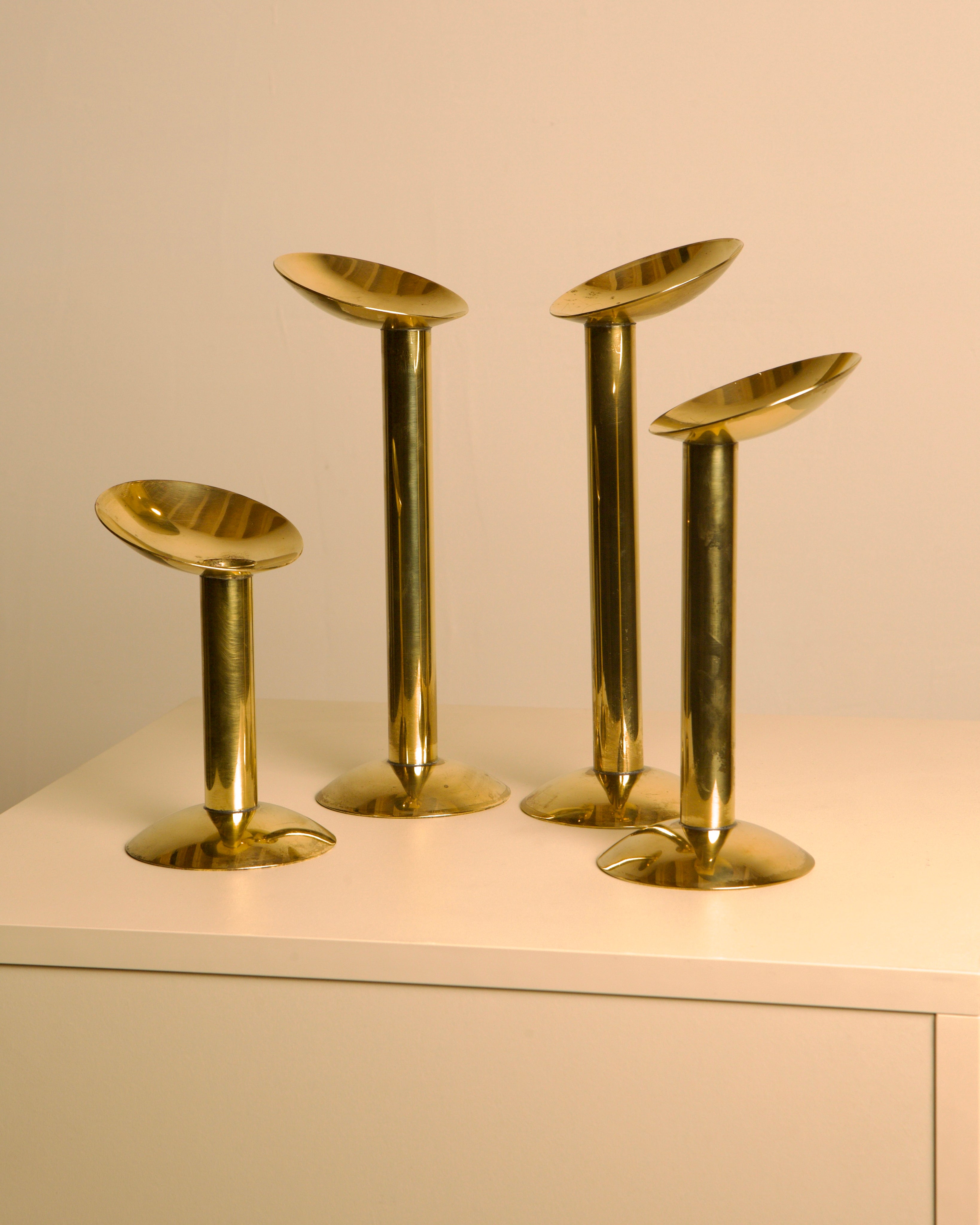 Set of 4 Danish brass candlesticks from the 1960s — side angle