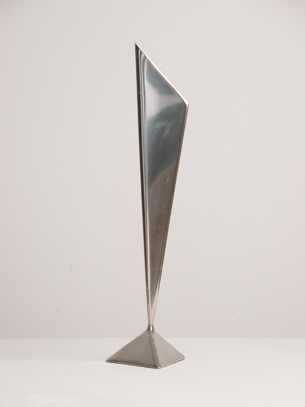 Folded Stainless Steel Bud Vase, Inverted Cone on Triangular Pyramid Foot, Space Age, 1960s-1970s — side angle