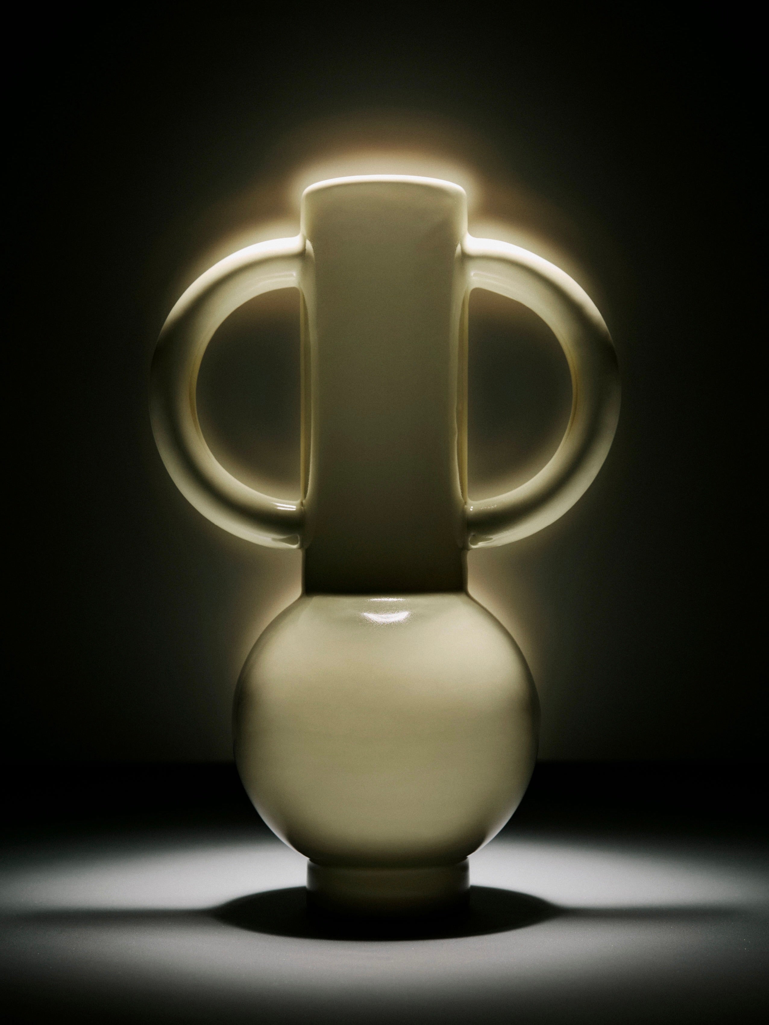 Limoncello ceramic vase with sculptural handles in soft green glaze