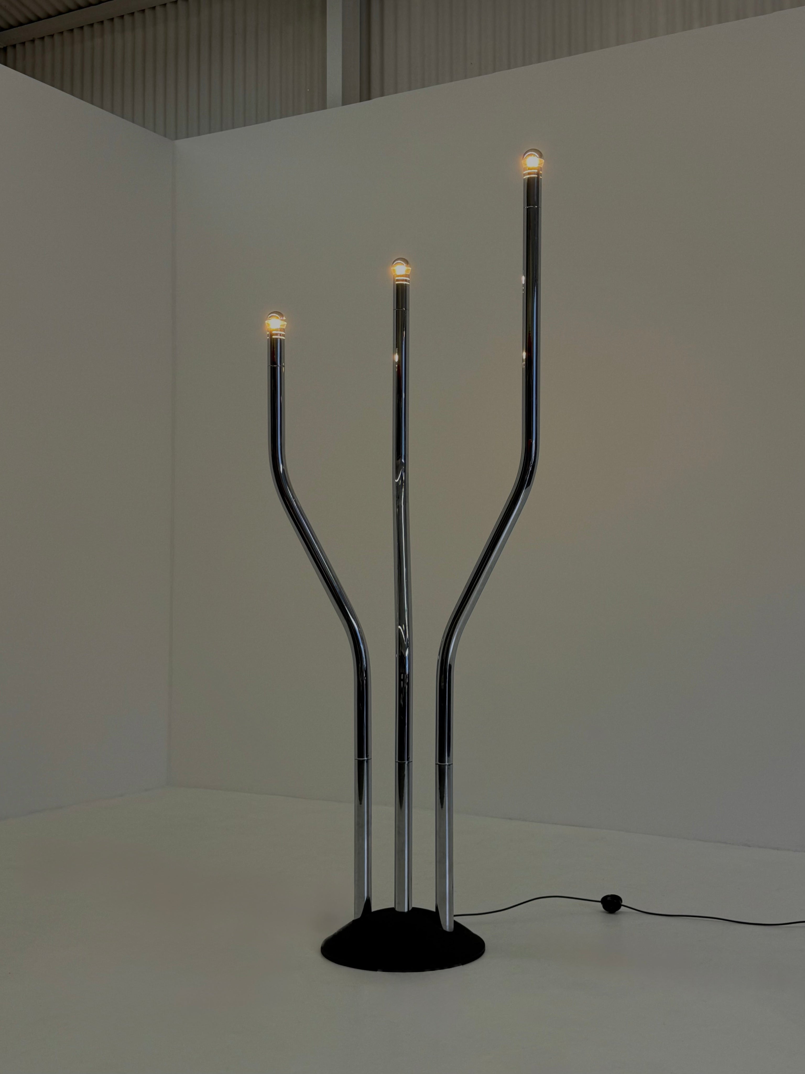 Chrome tubular frame designer floor lamp by Goffredo Reggiani — close-up