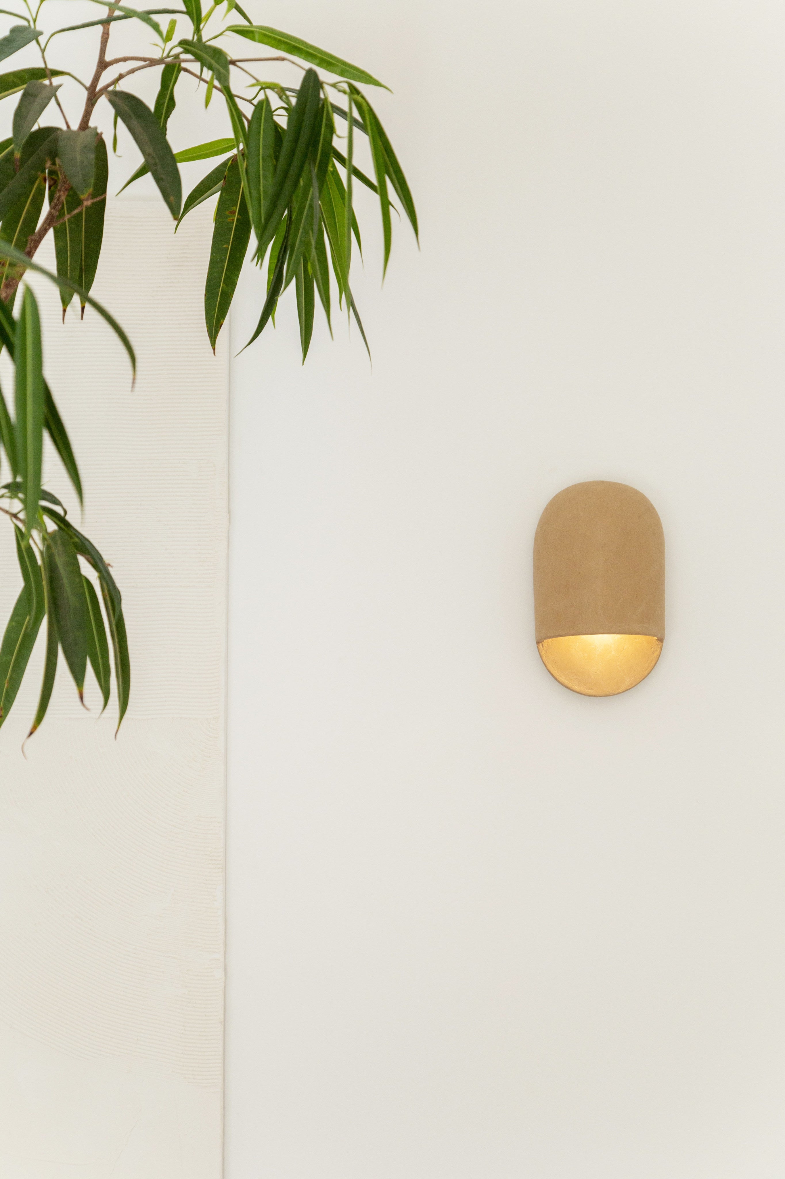 Tera Sconce Lime Plaster — in context