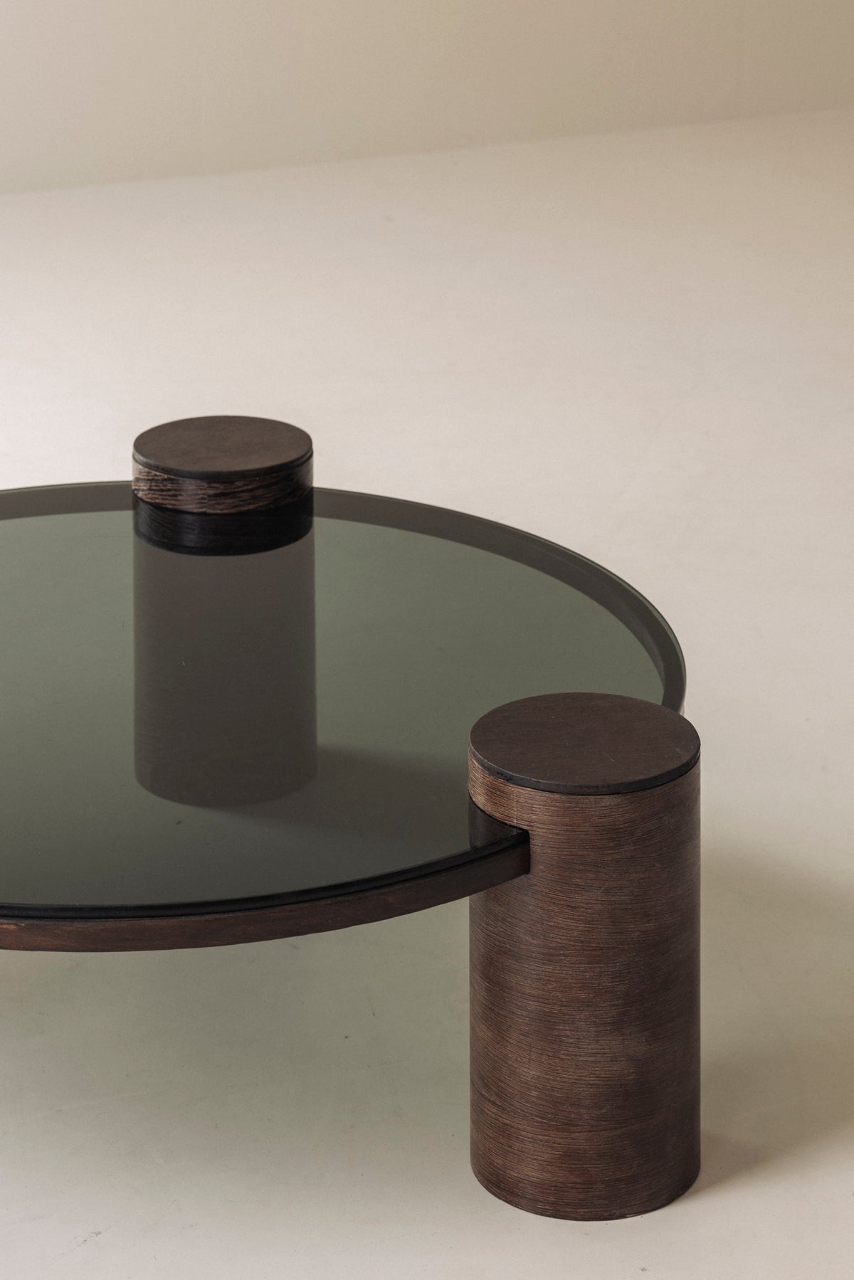 Sculptural Brutalist Wengé and Smoked Glass Round Coffee Table, 1970s — side angle