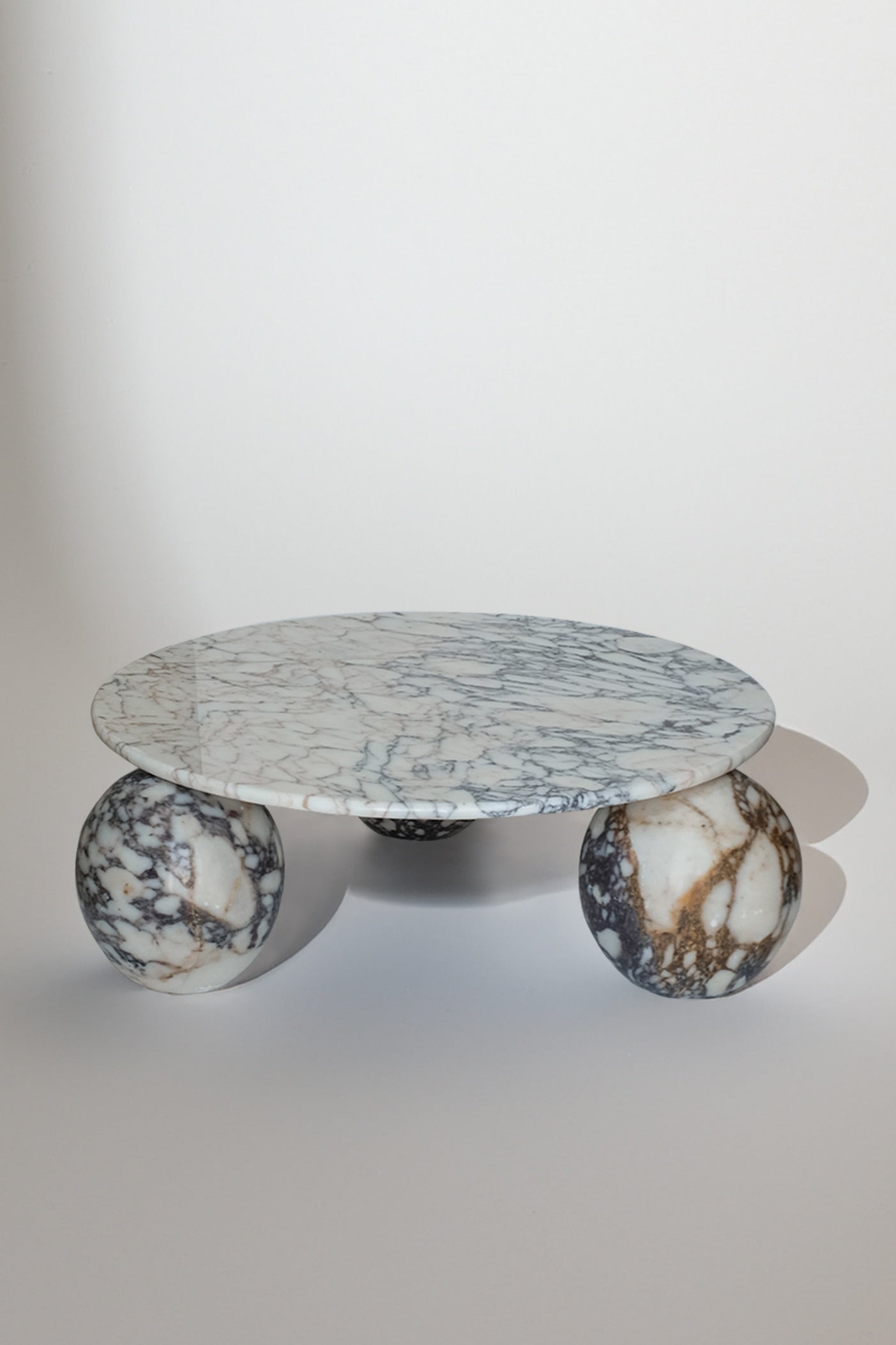 Sculptural Calacatta Viola Coffee Table — lifestyle setting