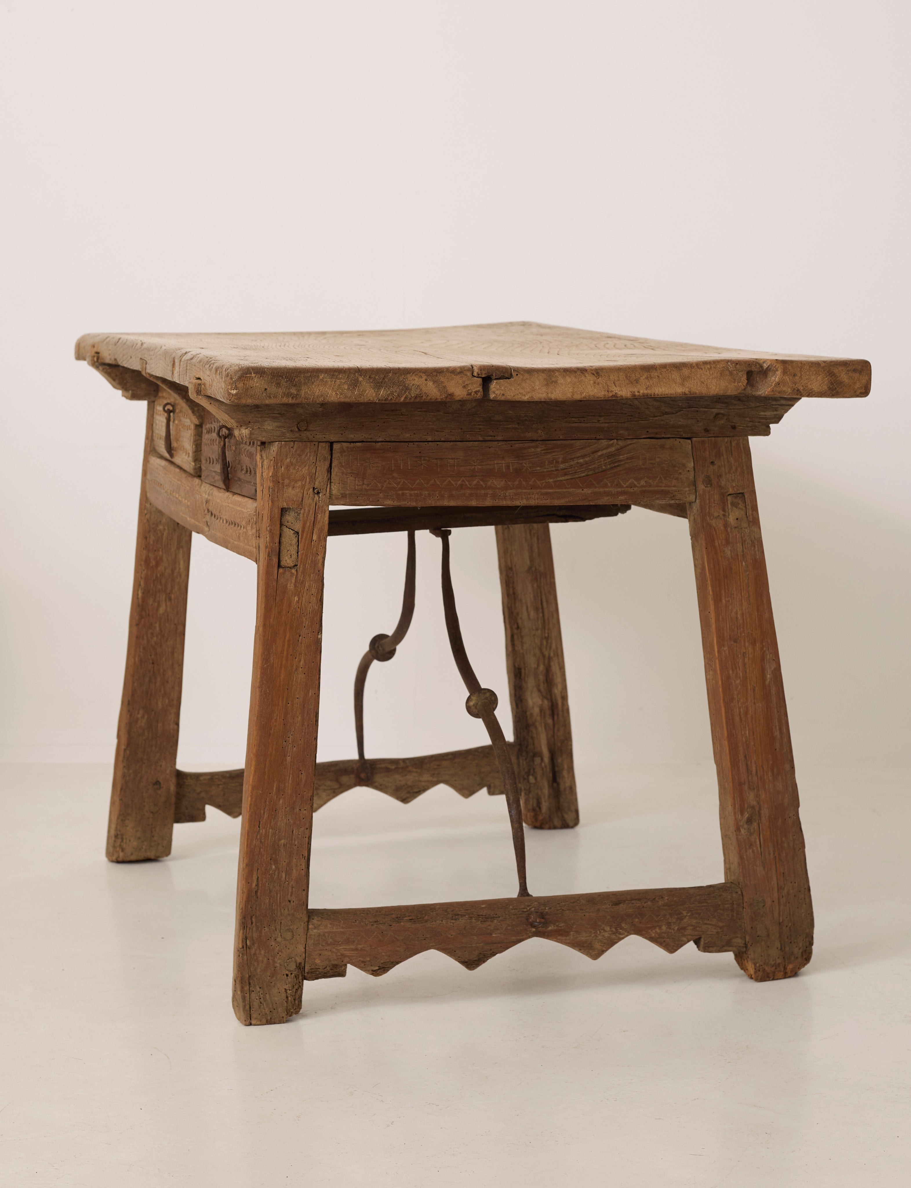 Spanish Folk Vernacular Table From The 17th Century — angled view showing rustic wooden frame