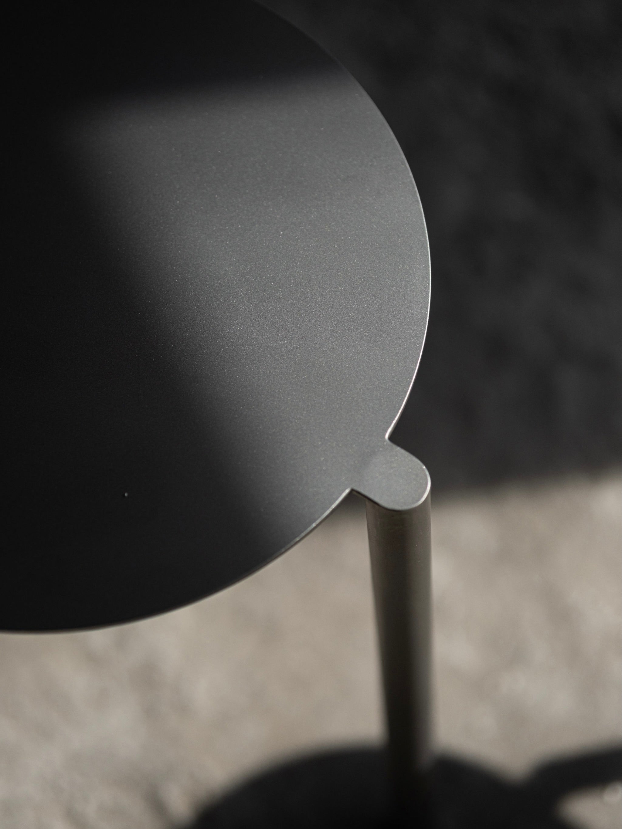 Stool - Isla x Paul Delrez - Stainless Steel — top view of round steel seat