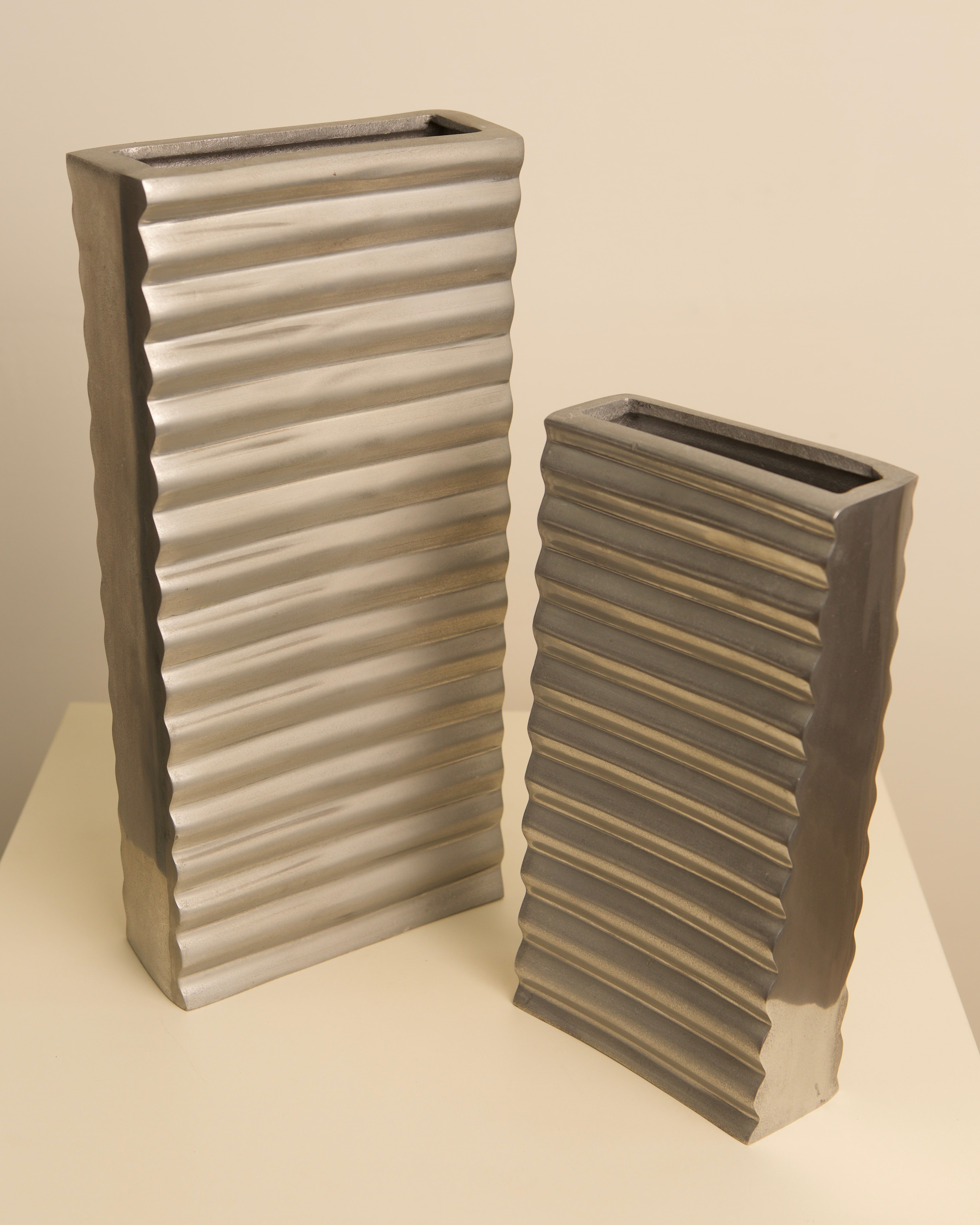 Italian aluminum ribbed vases 1980s, front and profile view