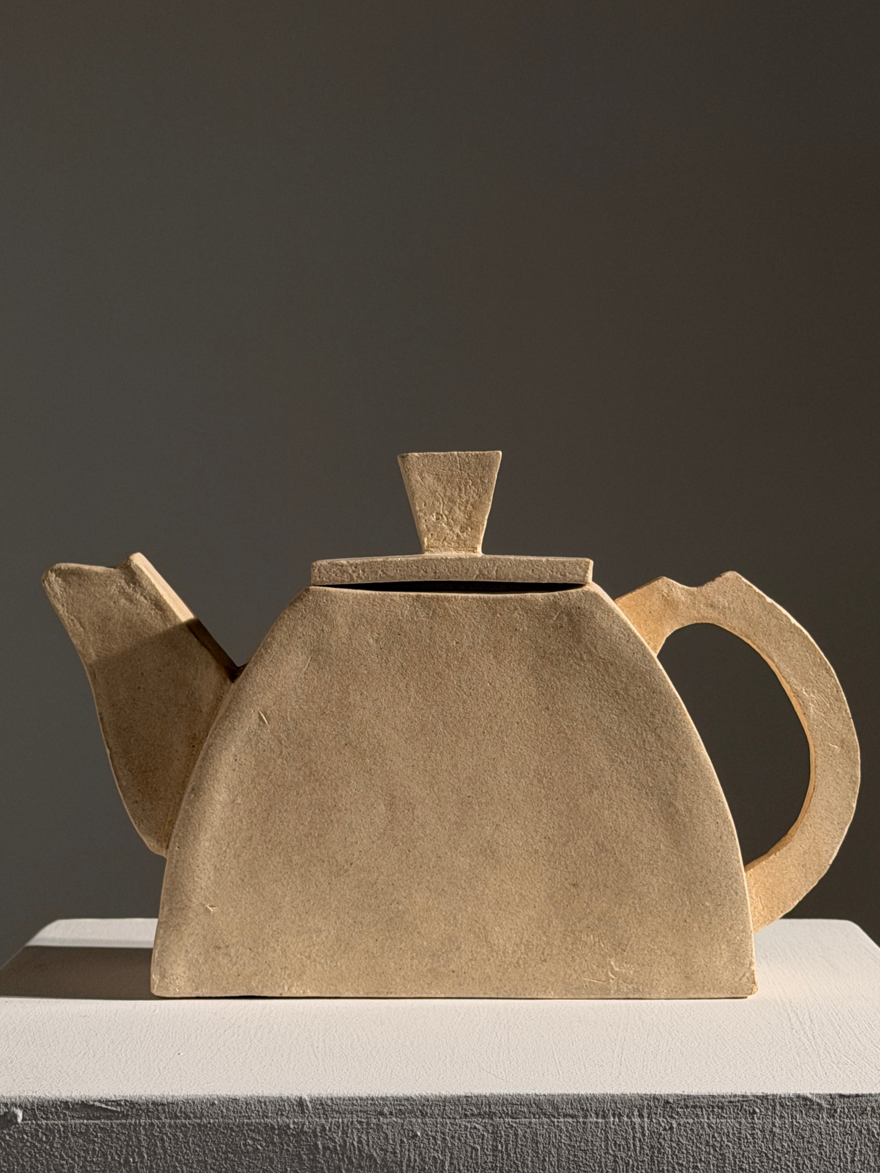 Geometric sculptural stoneware teapot, France, 1990 — lifestyle setting